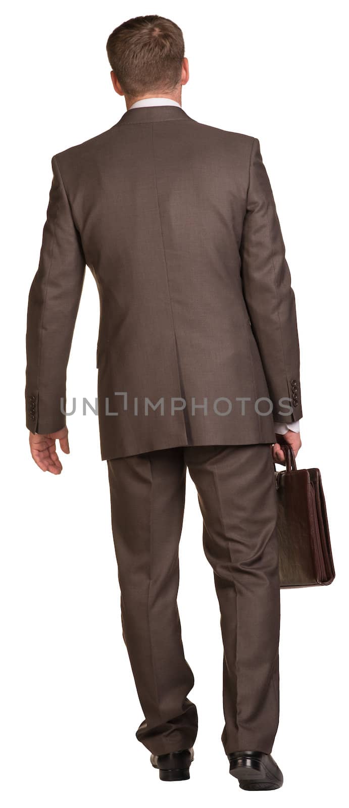 Walking businessman with briefcase. Rear view. Isolated on the white background.