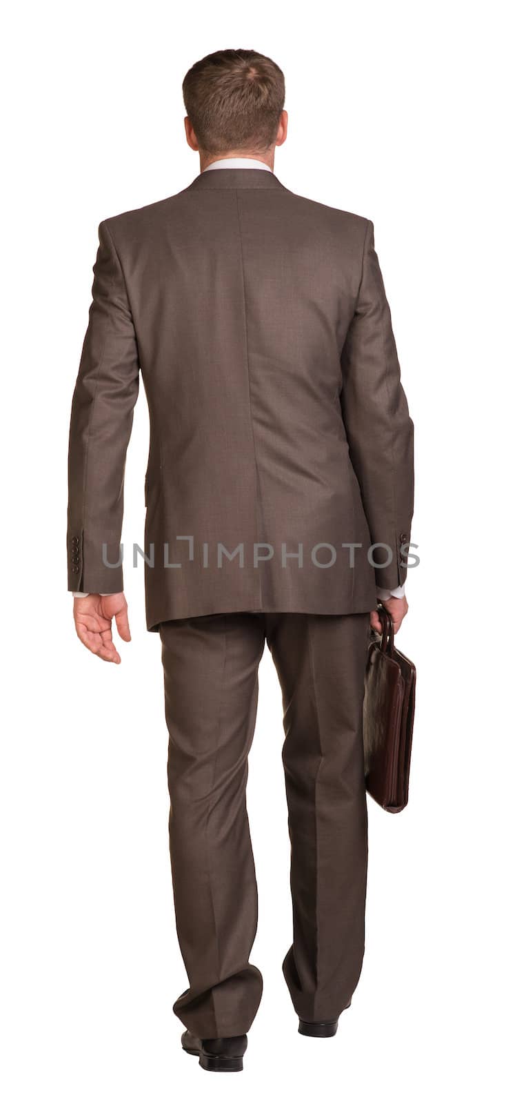Walking businessman with briefcase by cherezoff