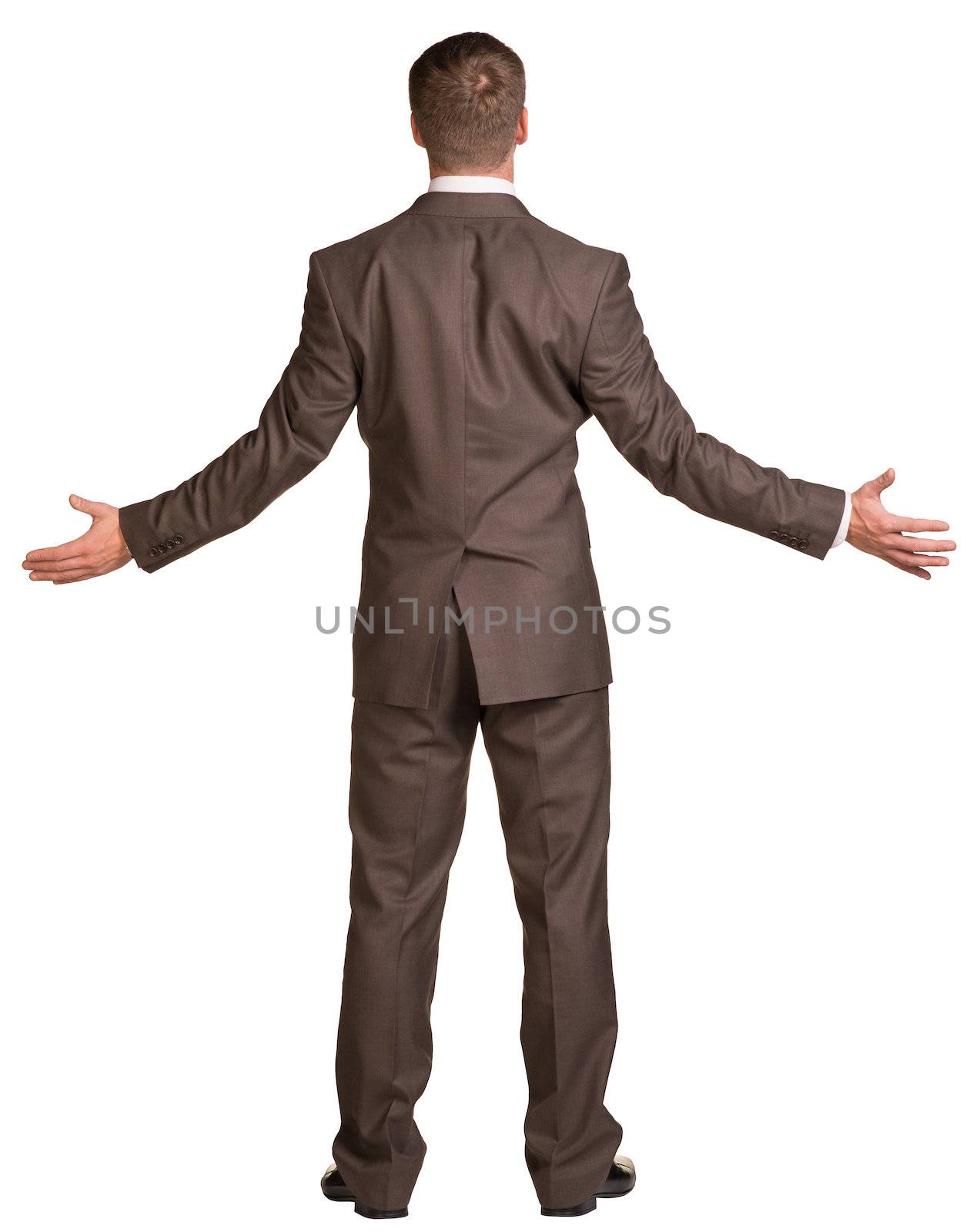 Businessman holding hands up to sides. Rear view. Isolated on white background.