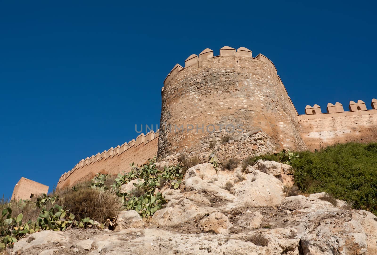 Embattled wall in the Alcazaba of Almeria, medieval Arabic fortress dating from the 10th century.