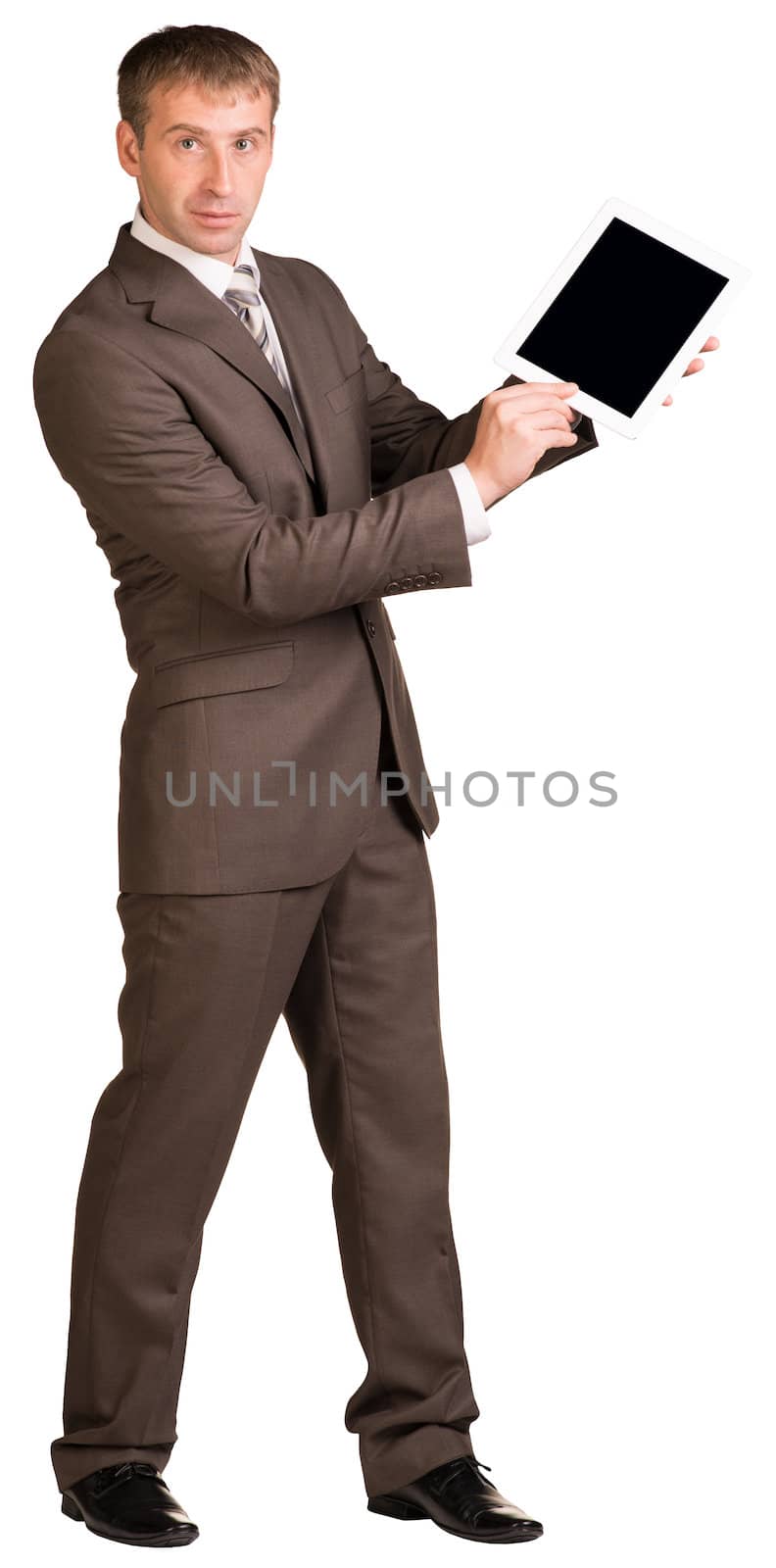 Businessman holding digital tablet by cherezoff