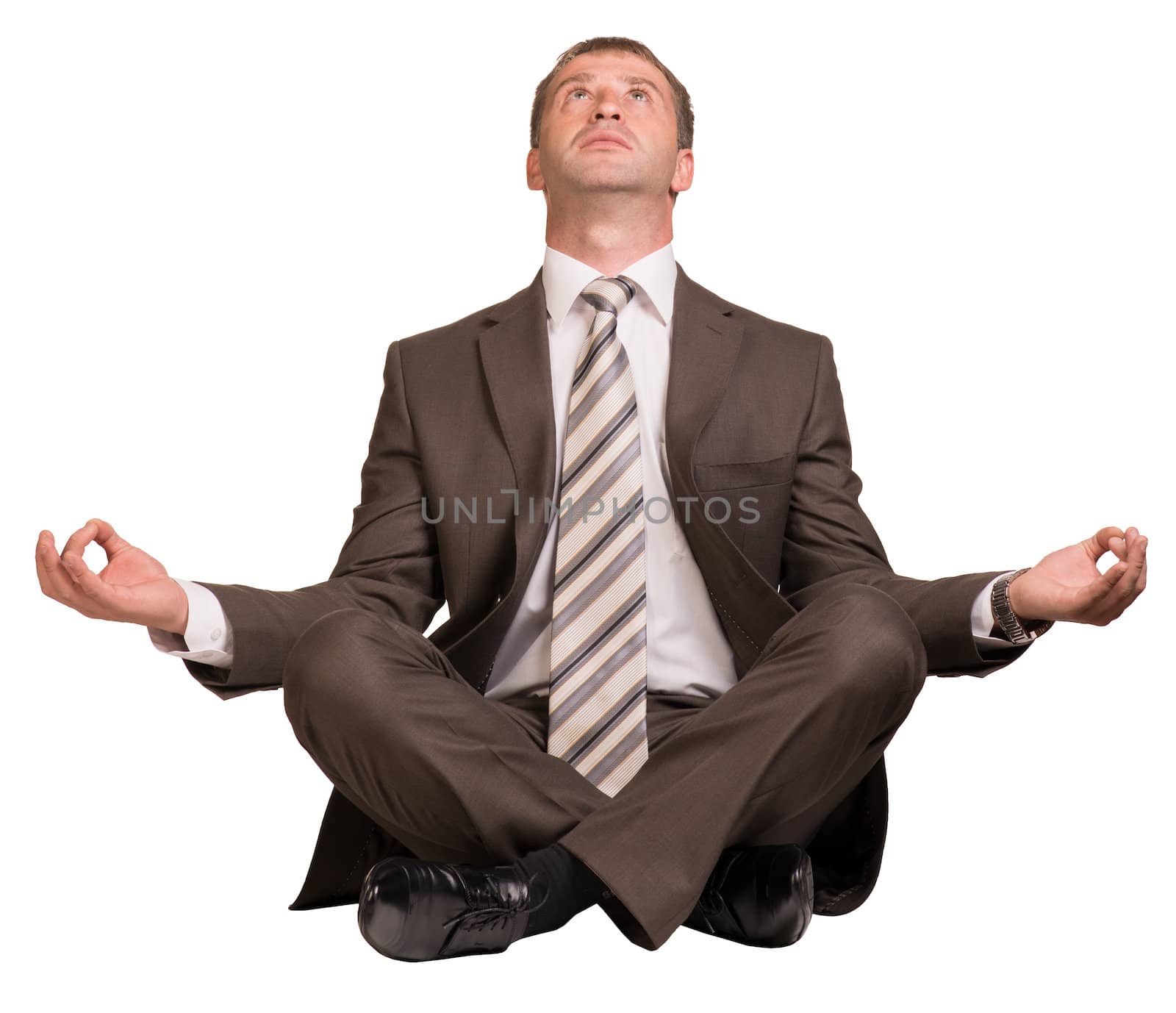 Businessman sitting in lotus position. Isolated on white background