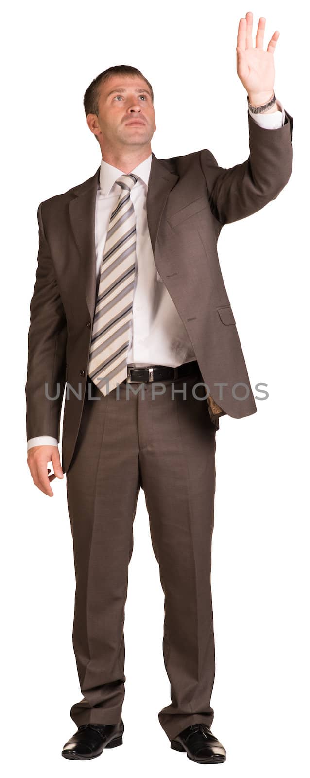 Businessman holding hand up in front of him by cherezoff