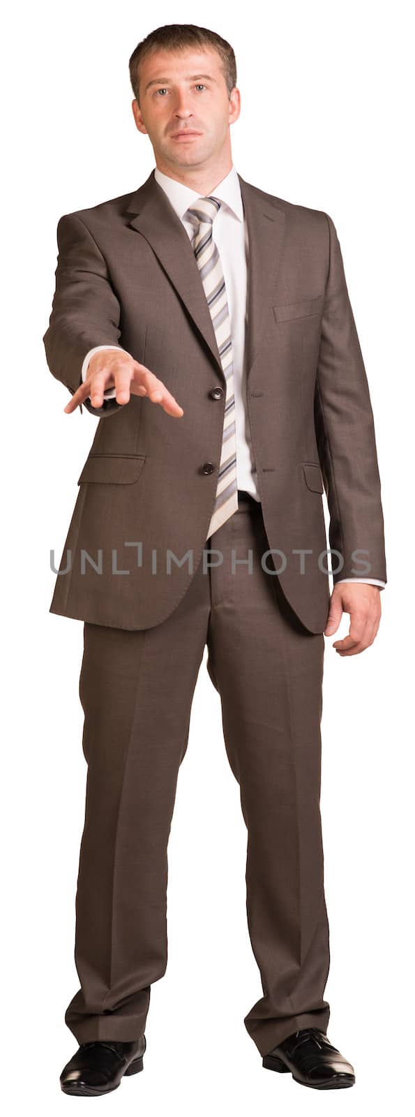 Businessman holding hand up in front of him by cherezoff