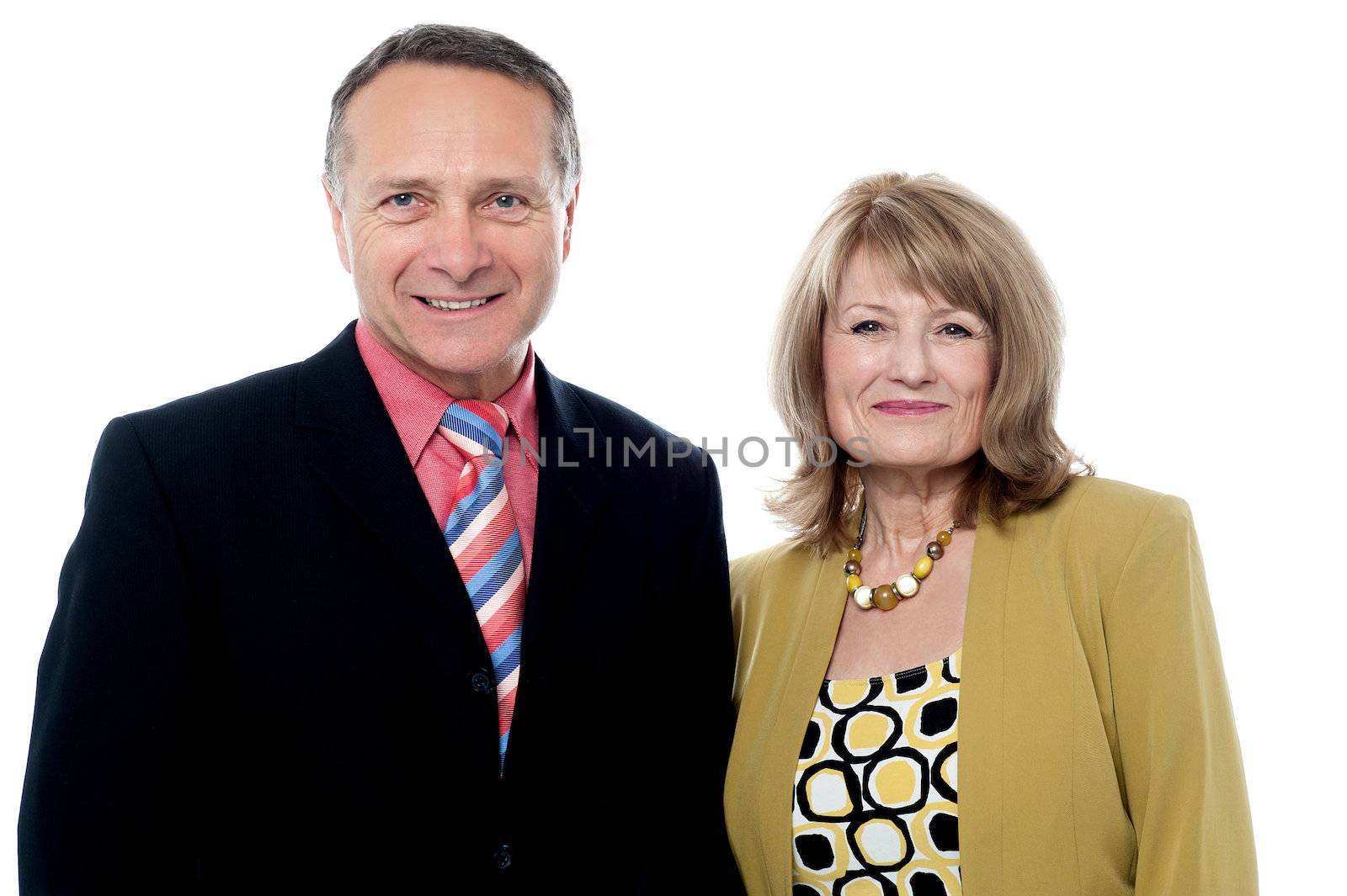 Senior couple posing over white background by stockyimages