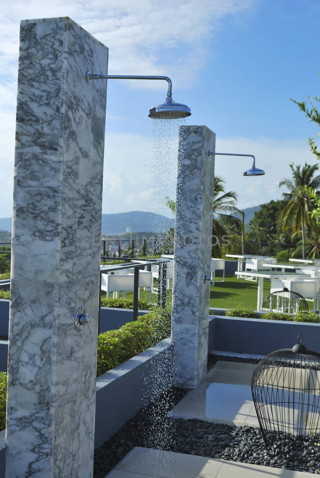 Outdoor shower at swimming pool and beach. The place you get clean after a nice day on the beach.