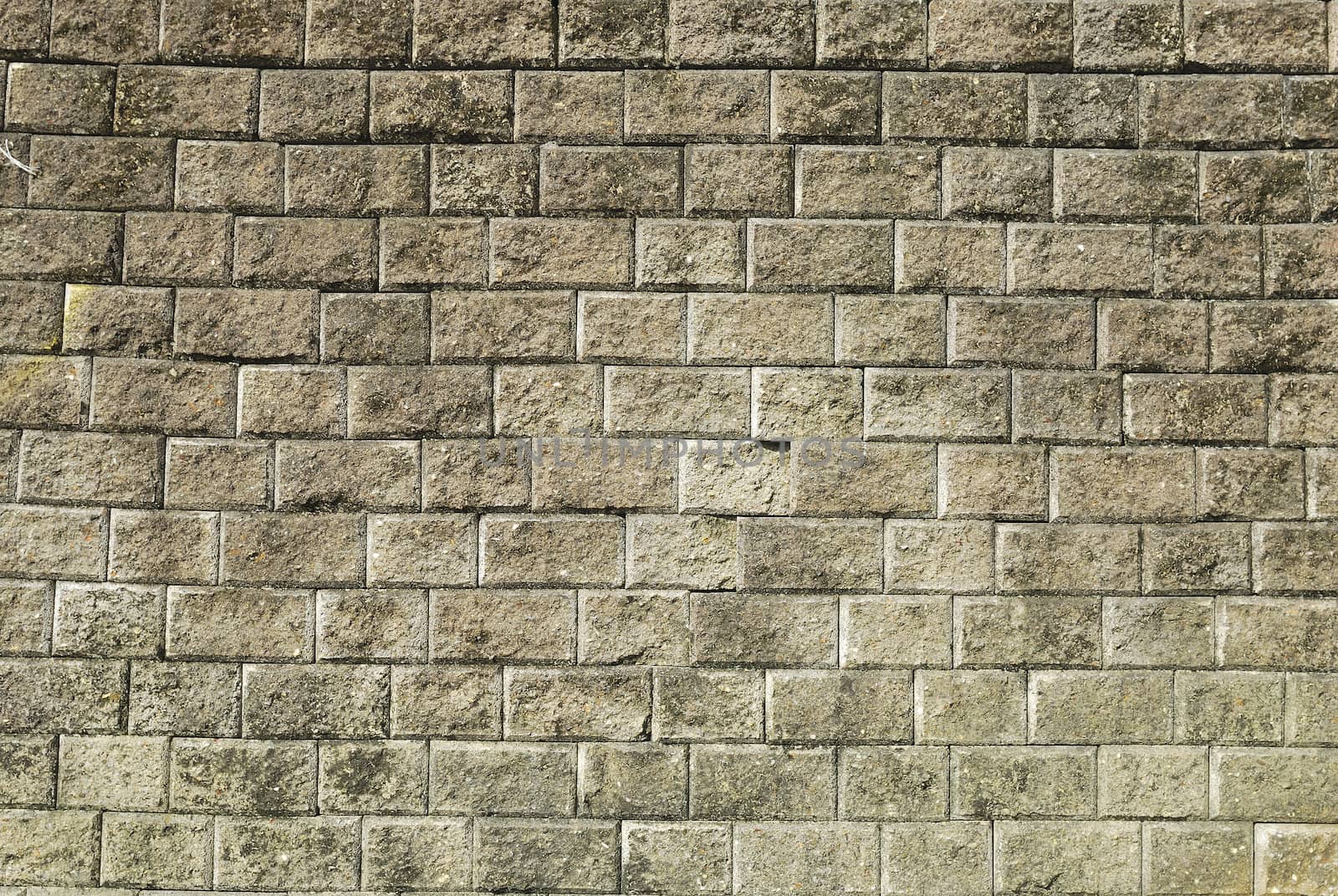 Stone brick wall with  weathered cement  background