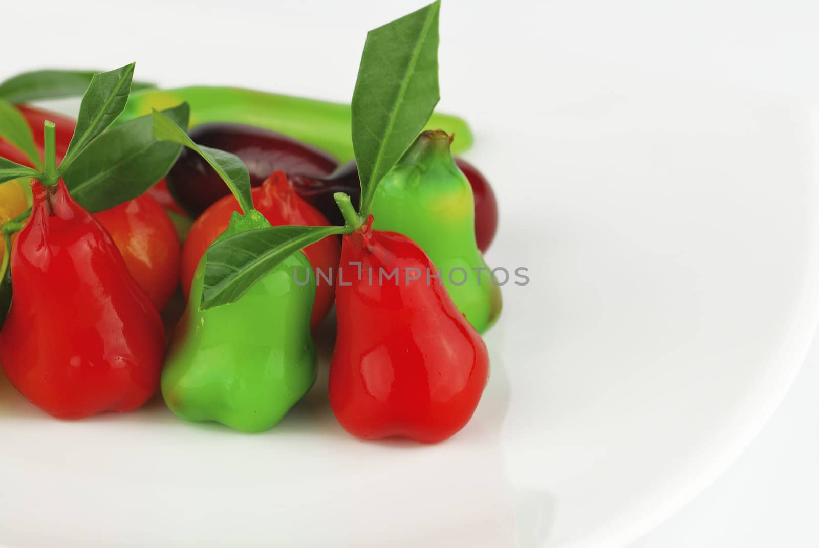 Thai style marzipan fruits. Thai dessert fruit-imitated soybean dumpling coated with jelly