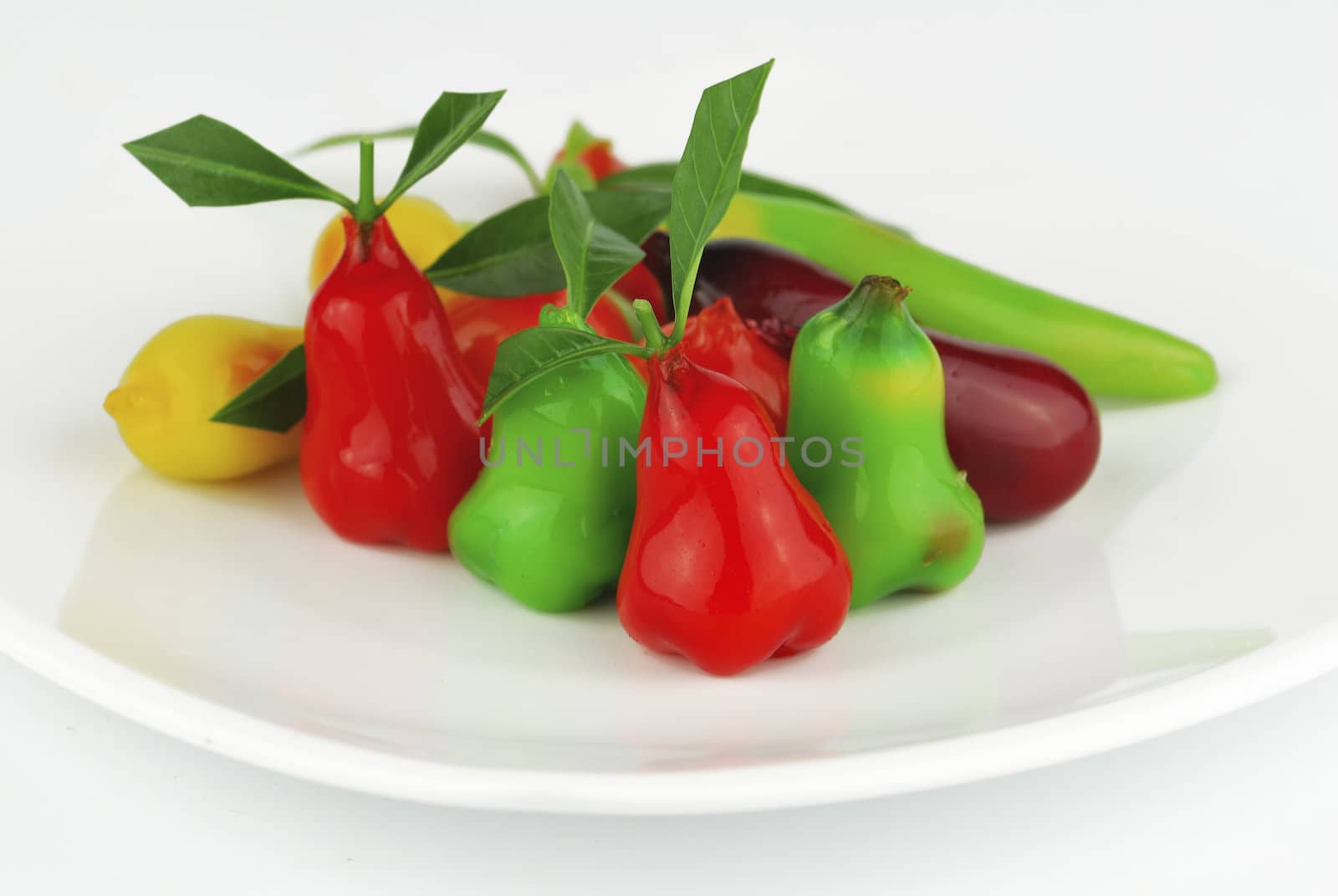 Thai style marzipan fruits. Thai dessert fruit-imitated soybean dumpling coated with jelly