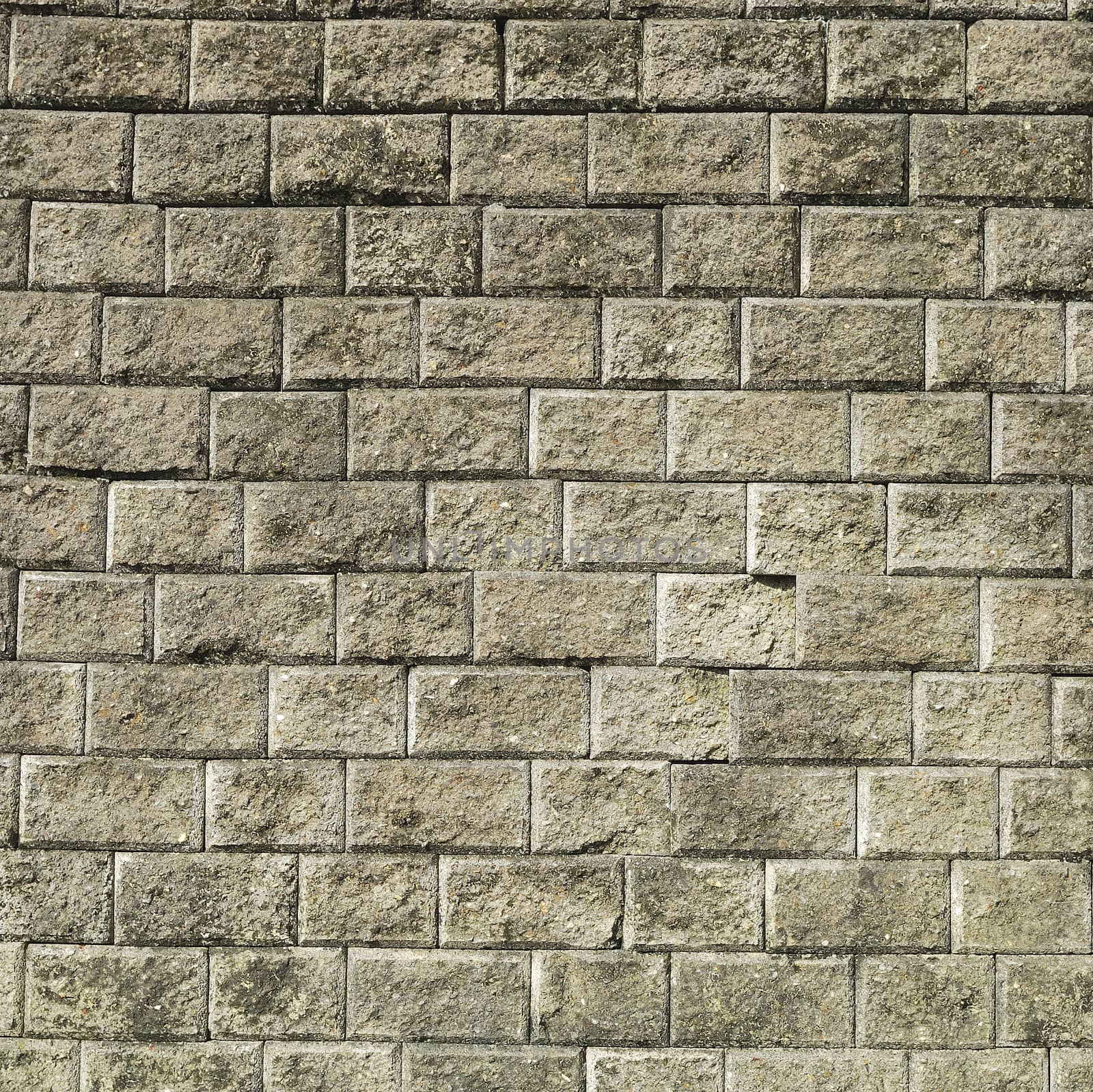 Stone brick wall with  weathered cement  background