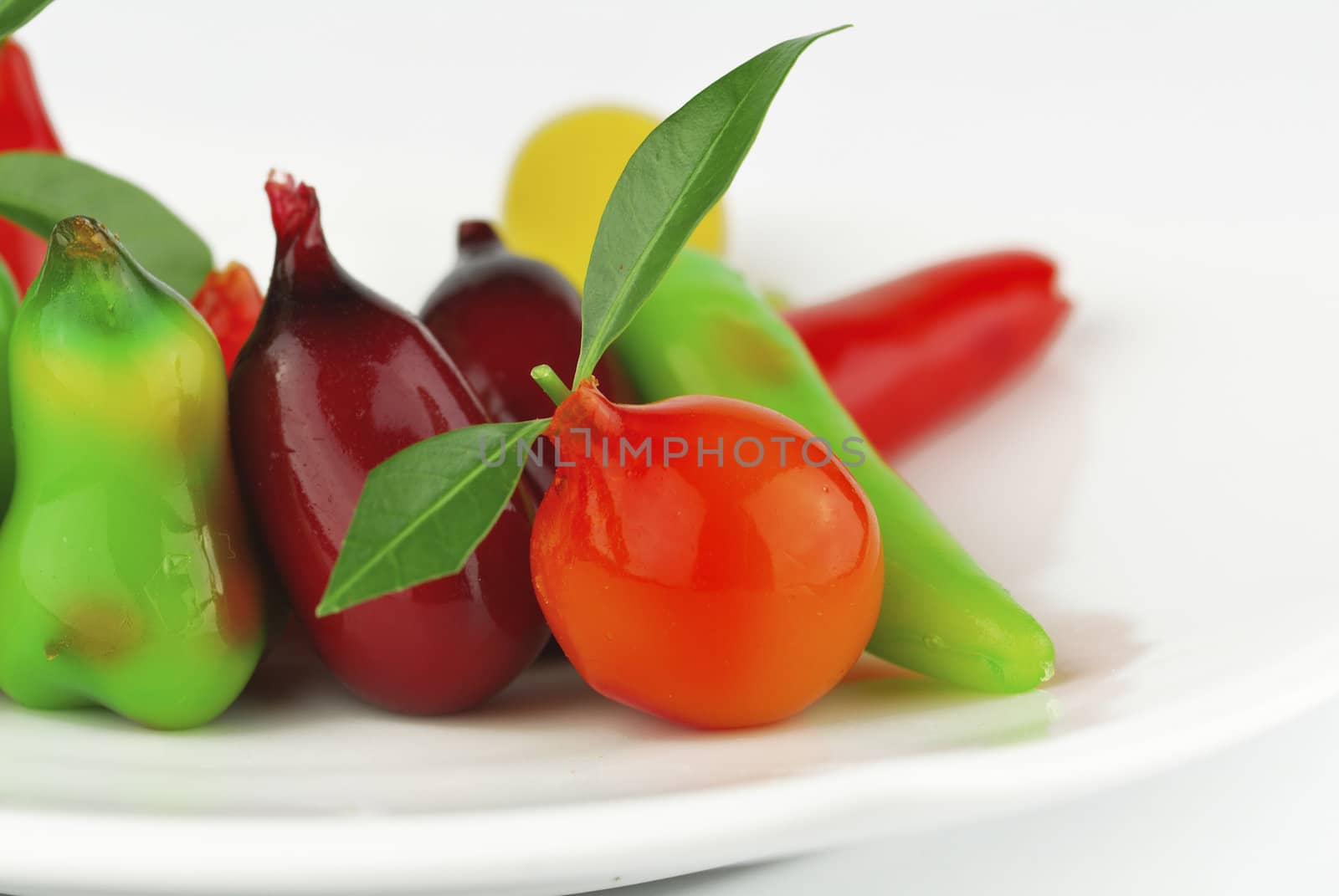 Thai style marzipan fruits. Thai dessert fruit-imitated soybean dumpling coated with jelly