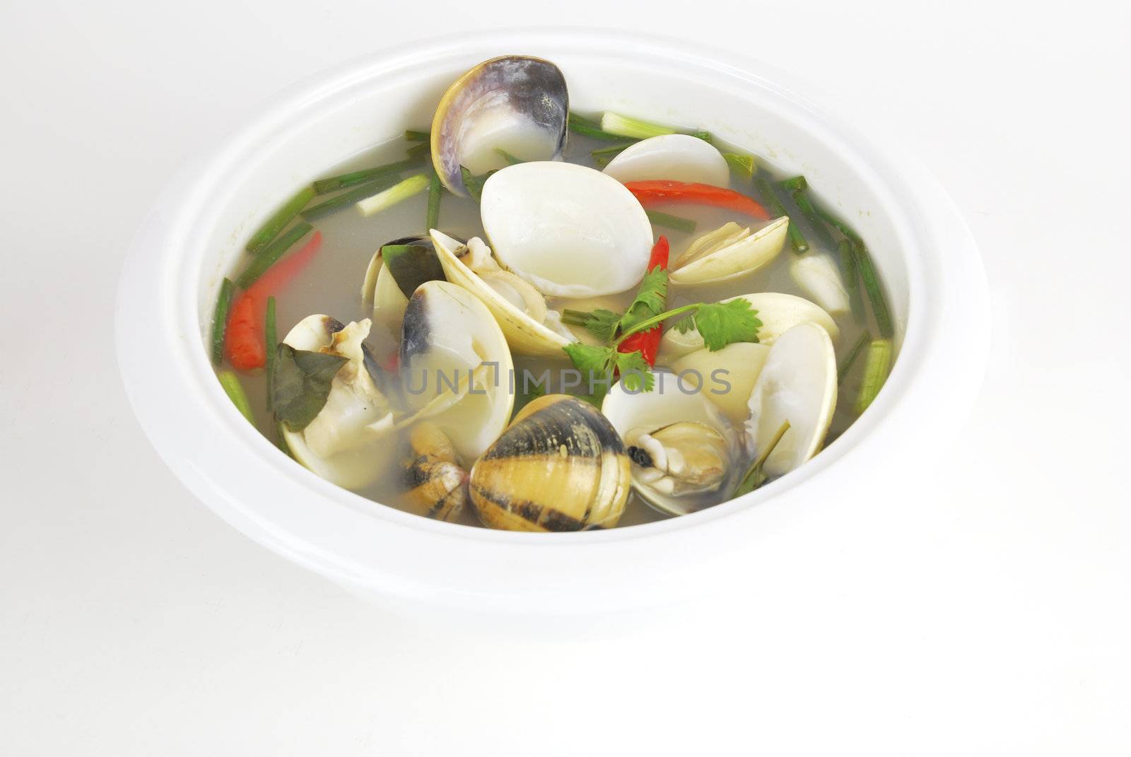 Tom yum or tom yam is a spicy clear soup typical in Laos and Thailand.