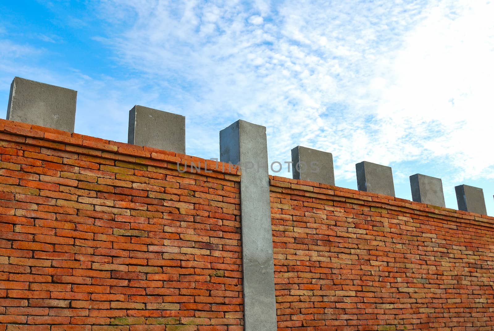 Brick wall and blue sky