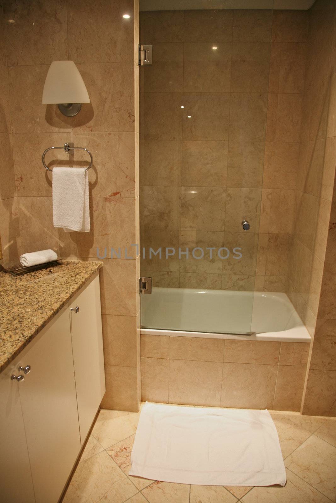 Grand Bathroom in Marble and White Toliet