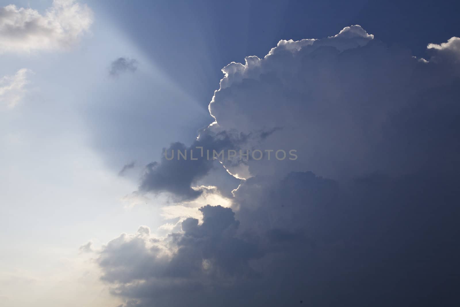 Sun shining through clouds