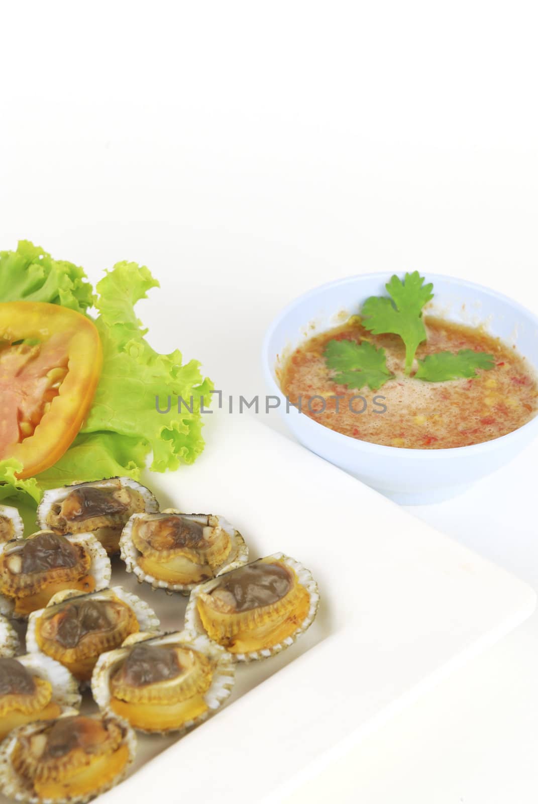 Steamed scallop on white background