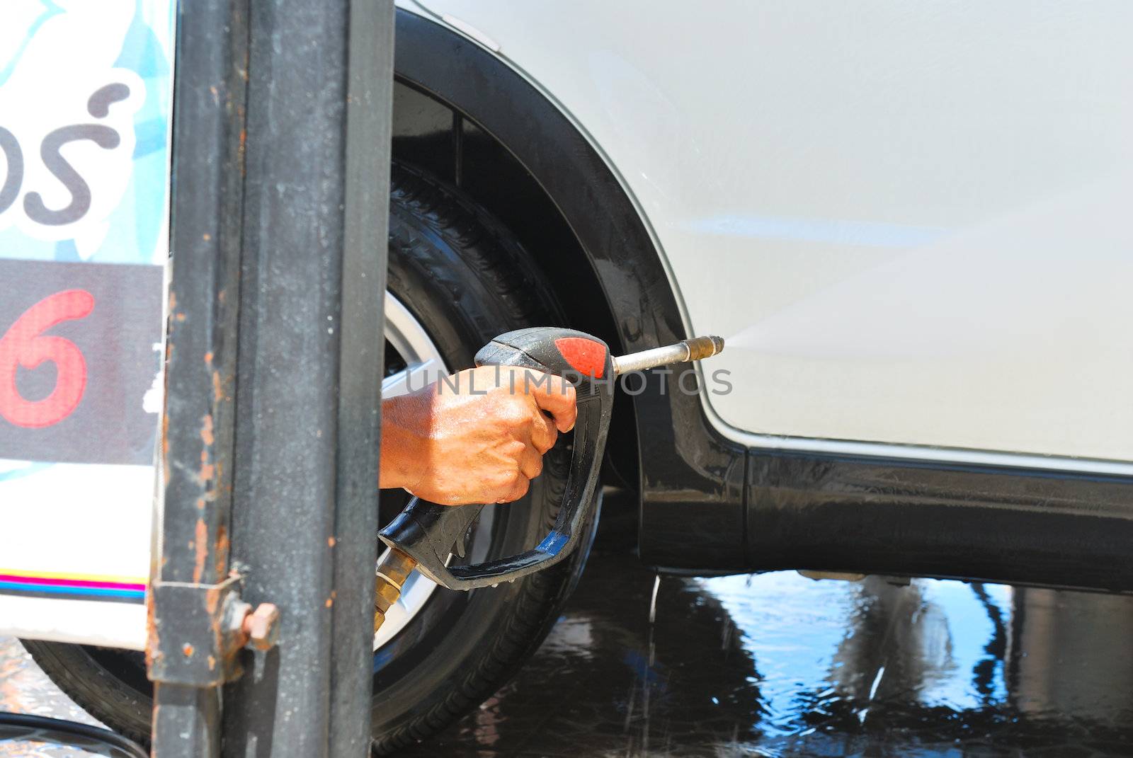 car washing cleaning with foam and hi pressured water