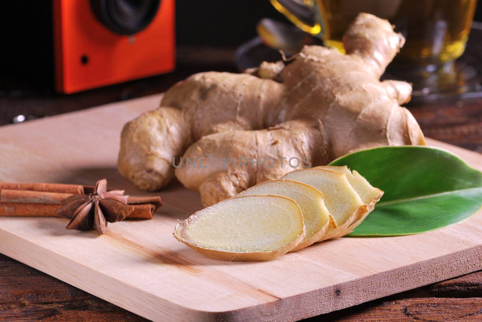 Ginger sliced on chop board wood table