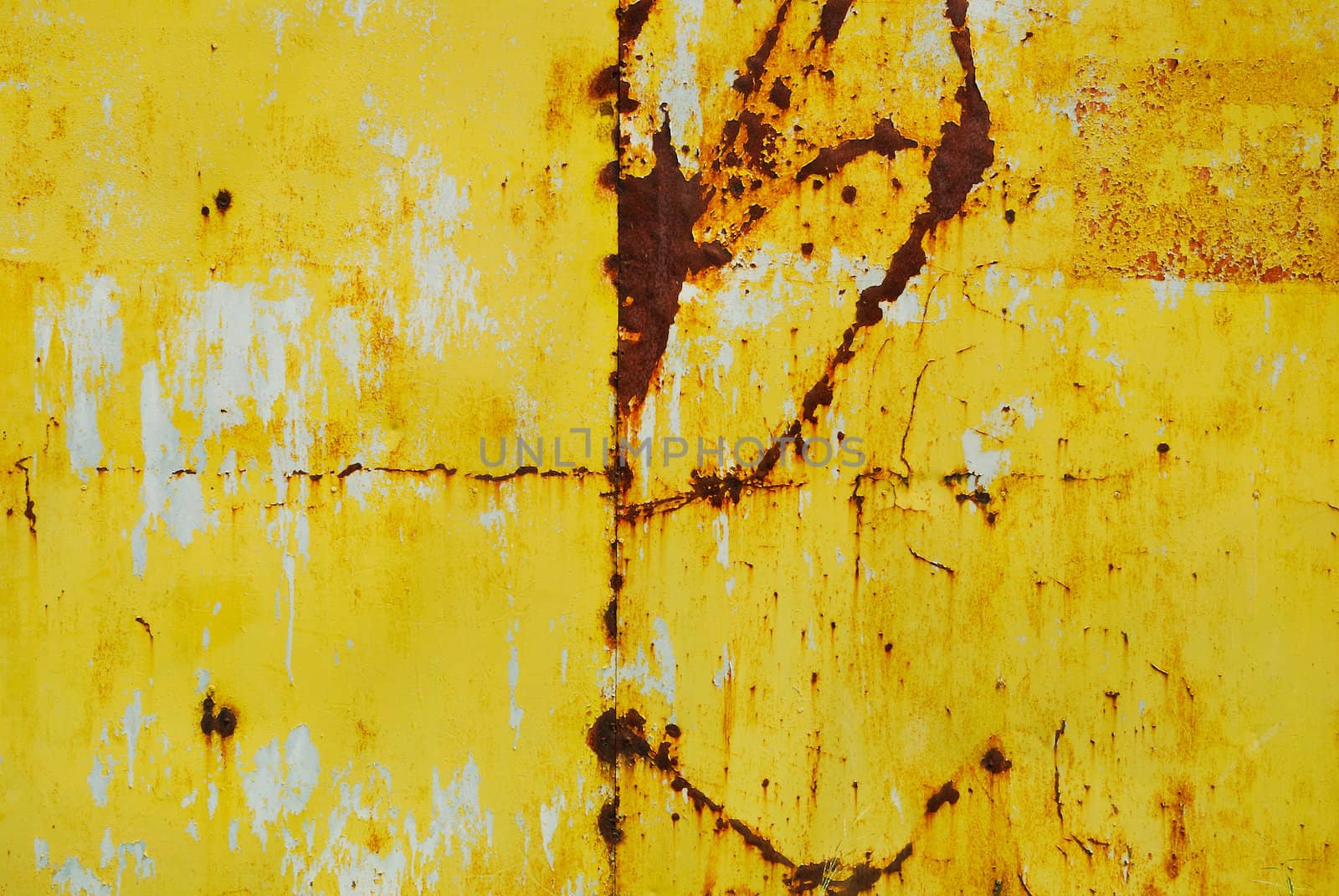 Yellow painted metal with rust texture