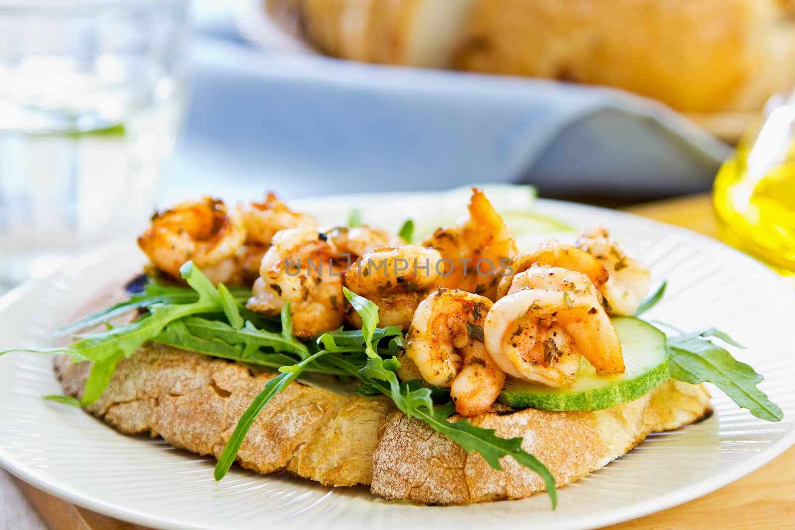 Grilled prawn with herbs and rocket sandwich