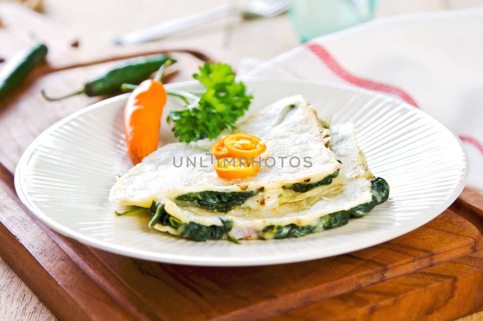 Spinach and cheese Quesadilla with chili on top