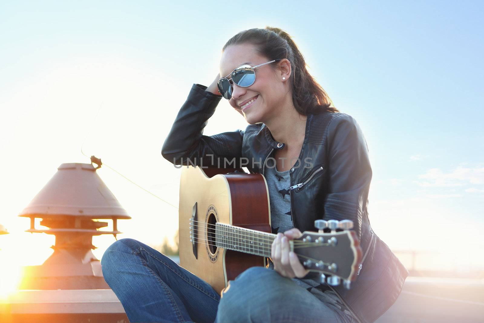Girl with acoustic guitar