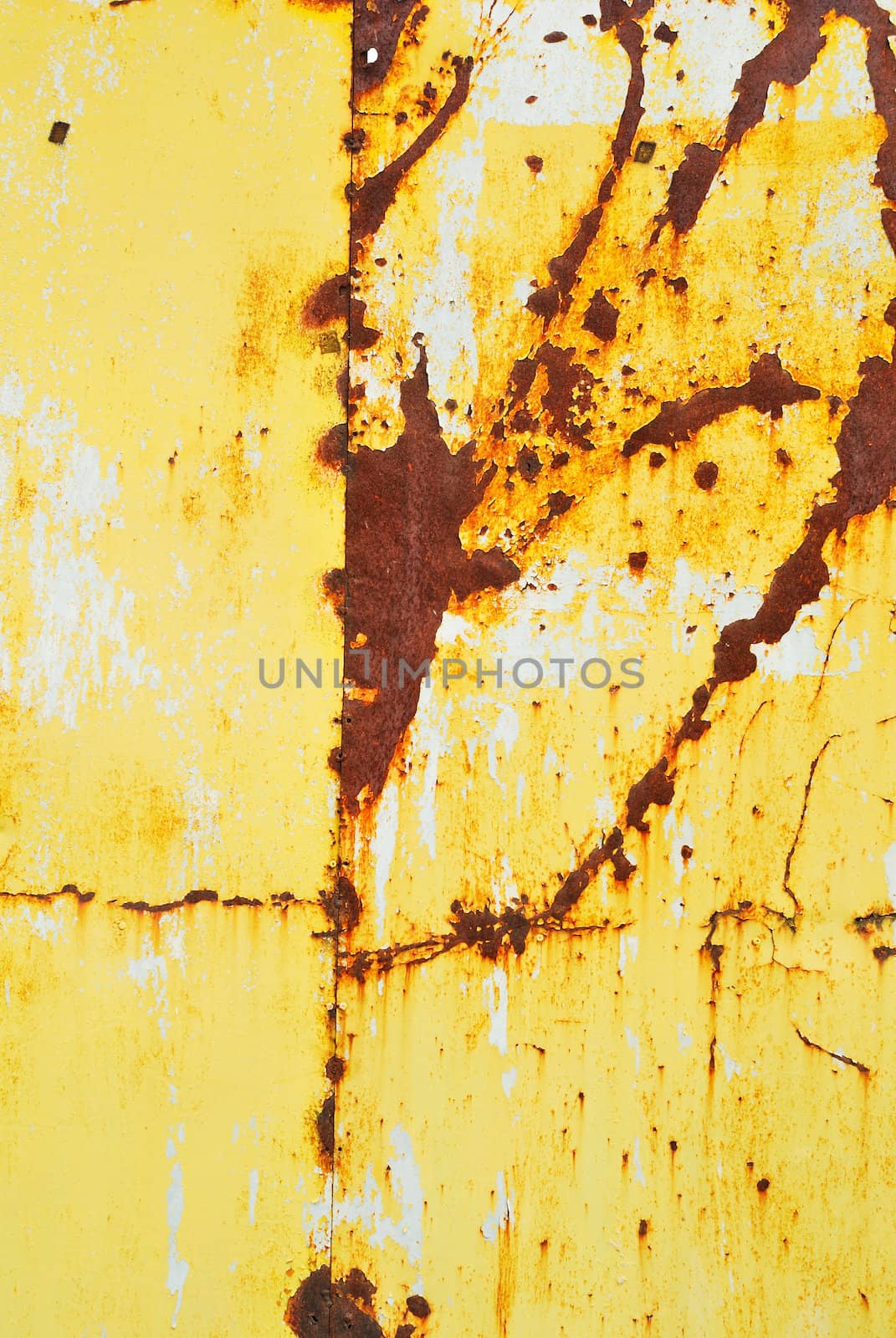 Yellow painted metal with rust texture