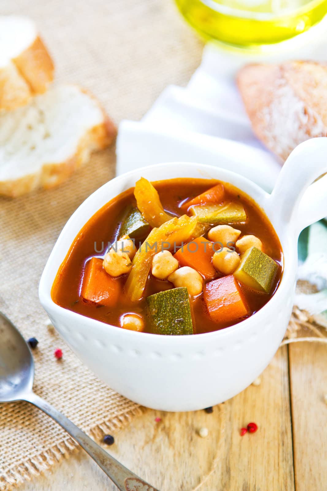 Vegetables with Chickpea soup by loaf of bread