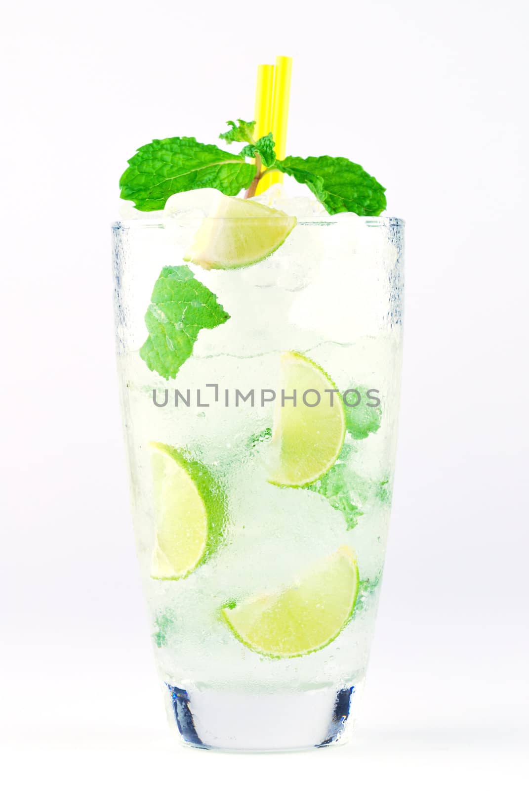 Mojito , lime pieces , leaves of mint with ice and rum