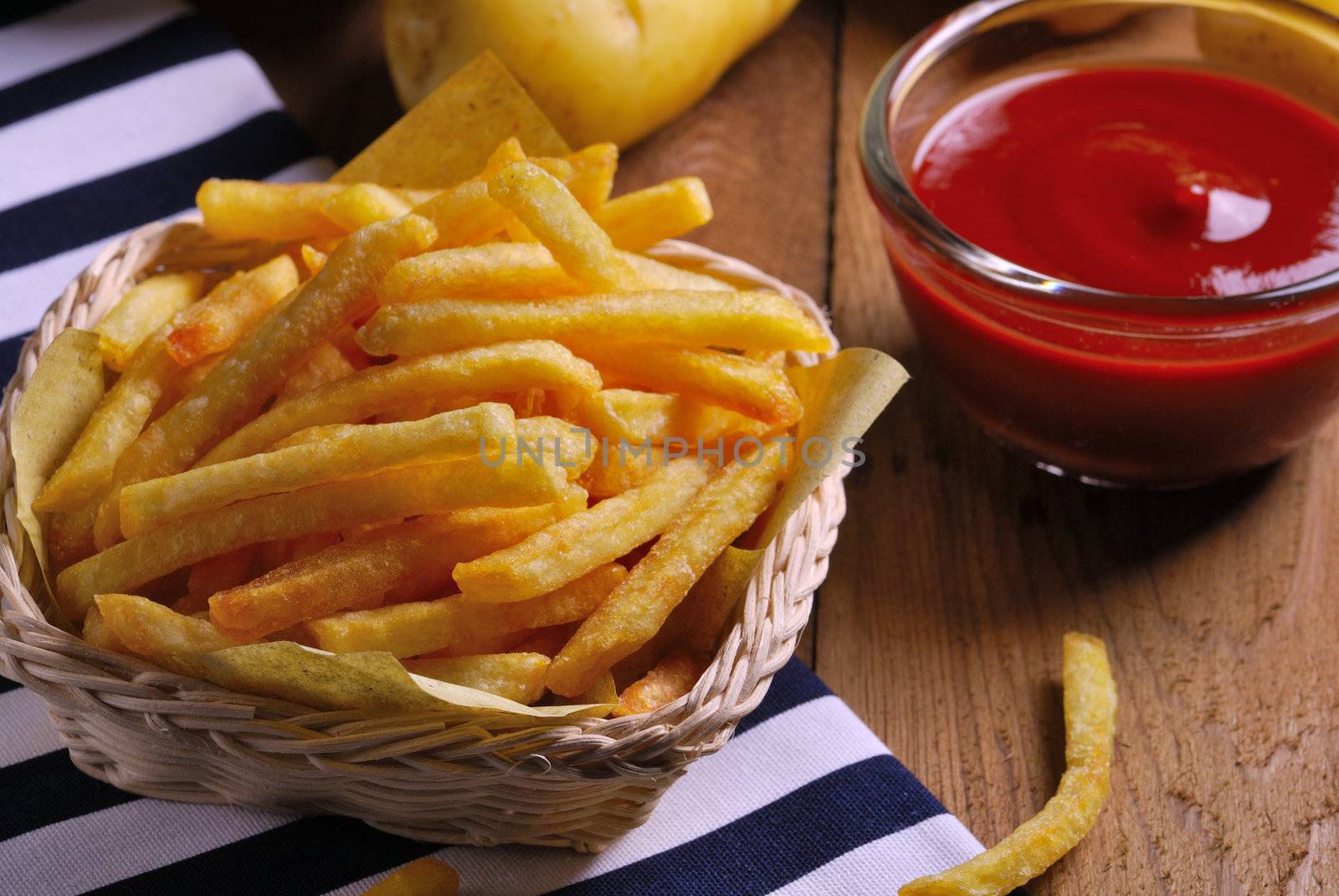 Traditional French fries with ketchup