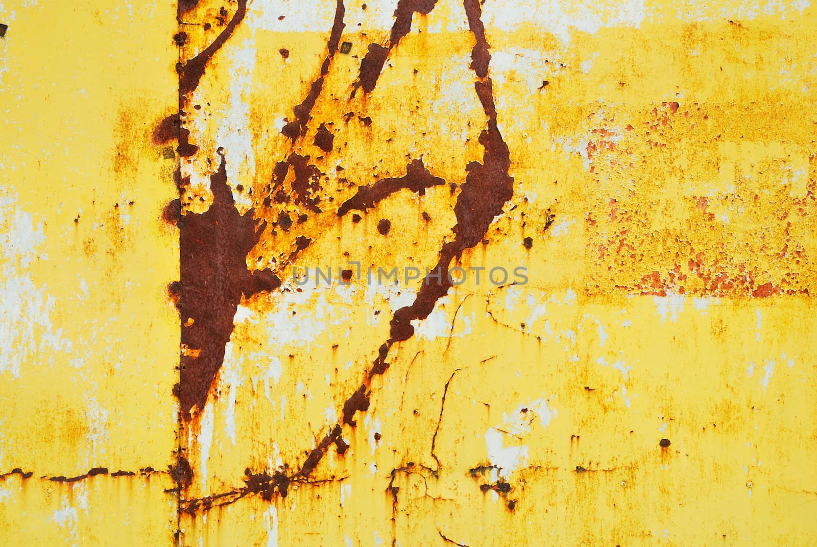 Yellow painted metal with rust texture