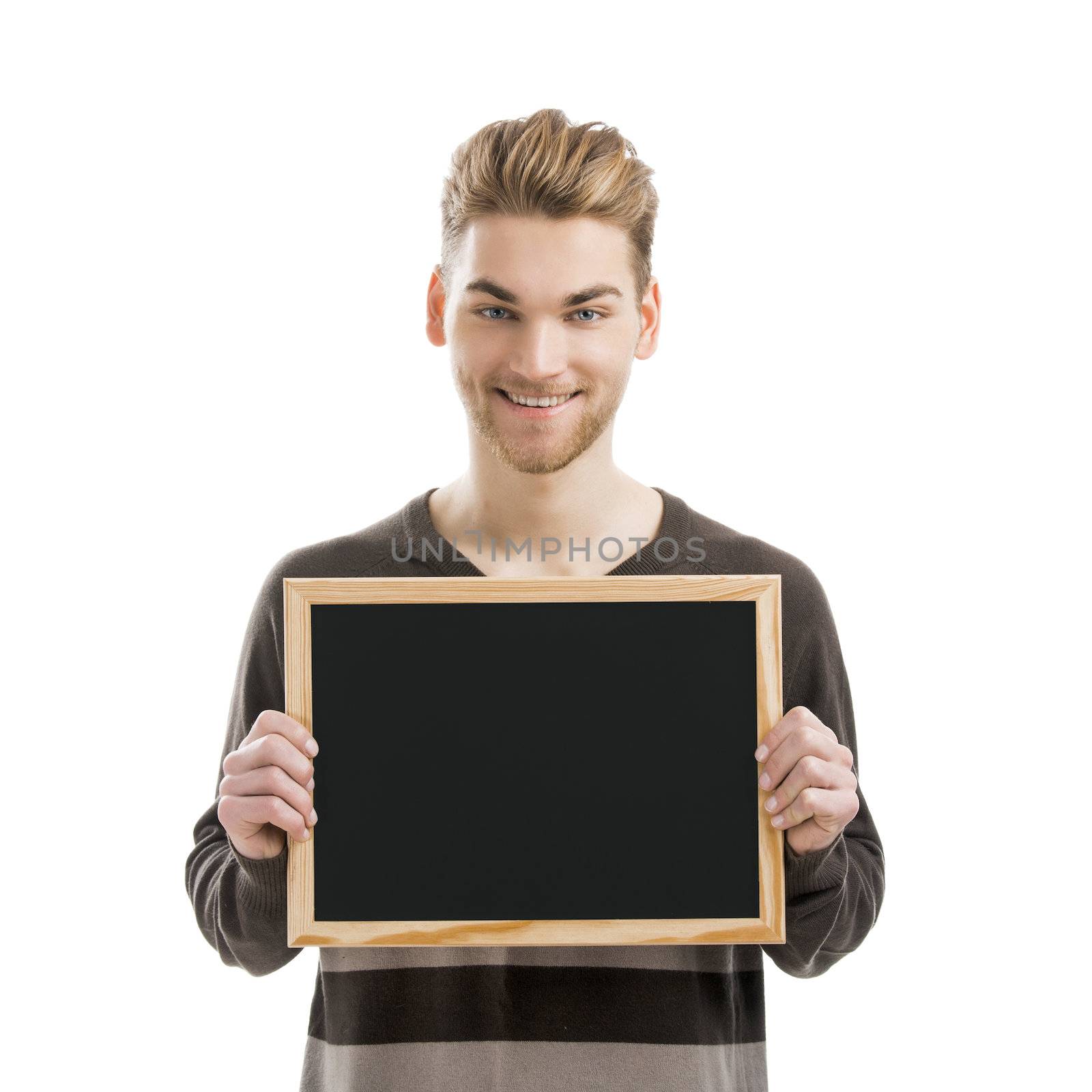 Good looking young man holding a chalkboard