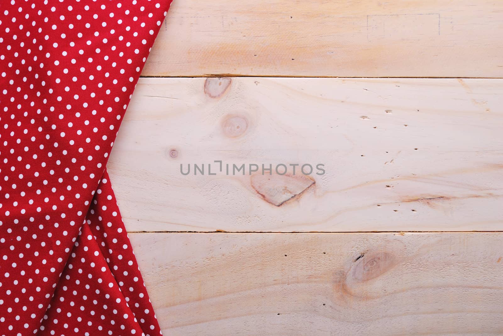 the background made from tablecloth on wooden table