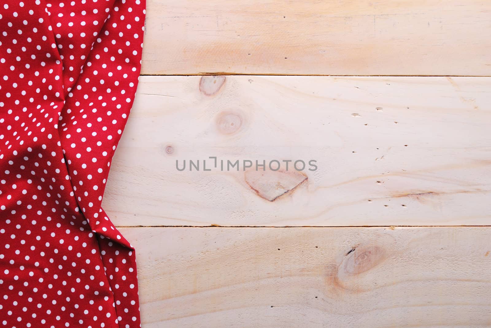 the background made from tablecloth on wooden table