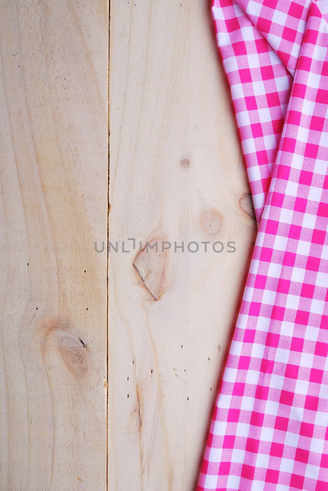 the background made from tablecloth on wooden table