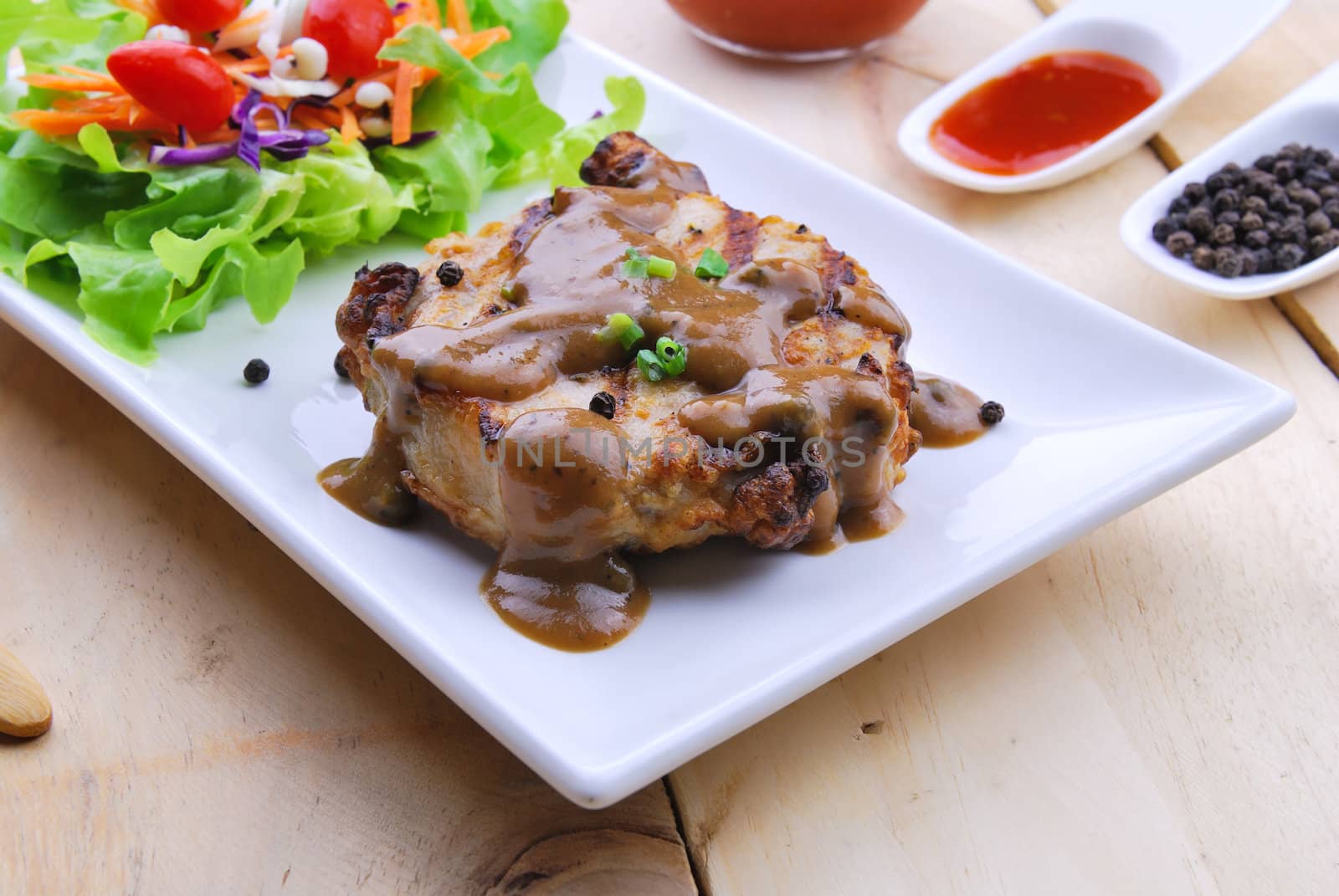 Grilled steaks, pork with pepper gravy and vegetable salad  by teen00000