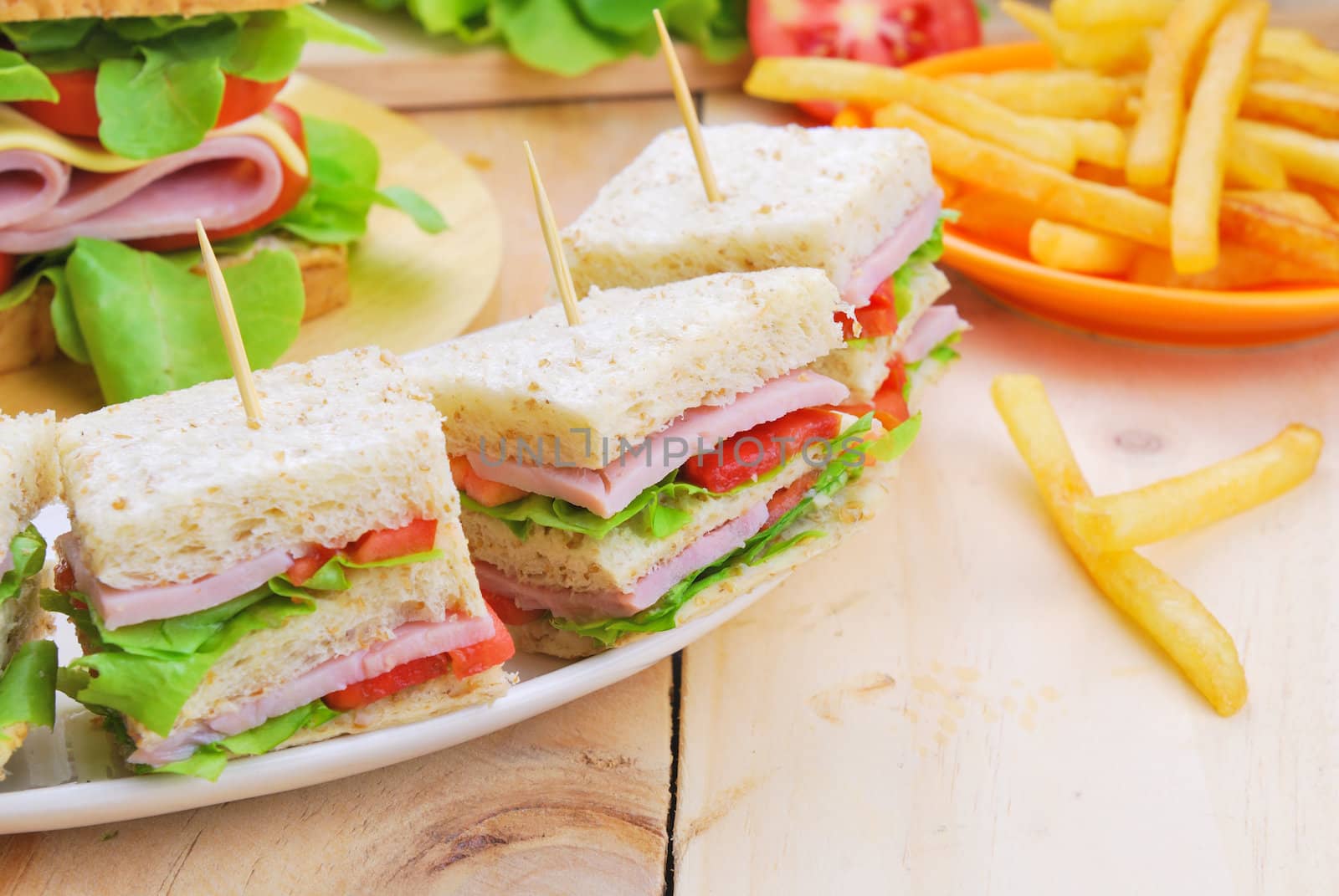 Club Sandwich with Cheese, Pickled Cucumber, Tomato and ham. Gar by teen00000