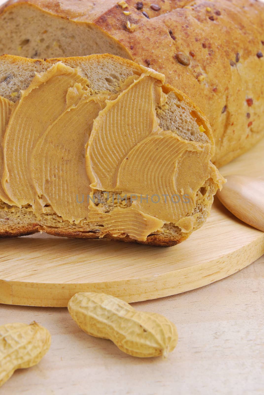 Peanut butter and whole grain , whole wheat bread