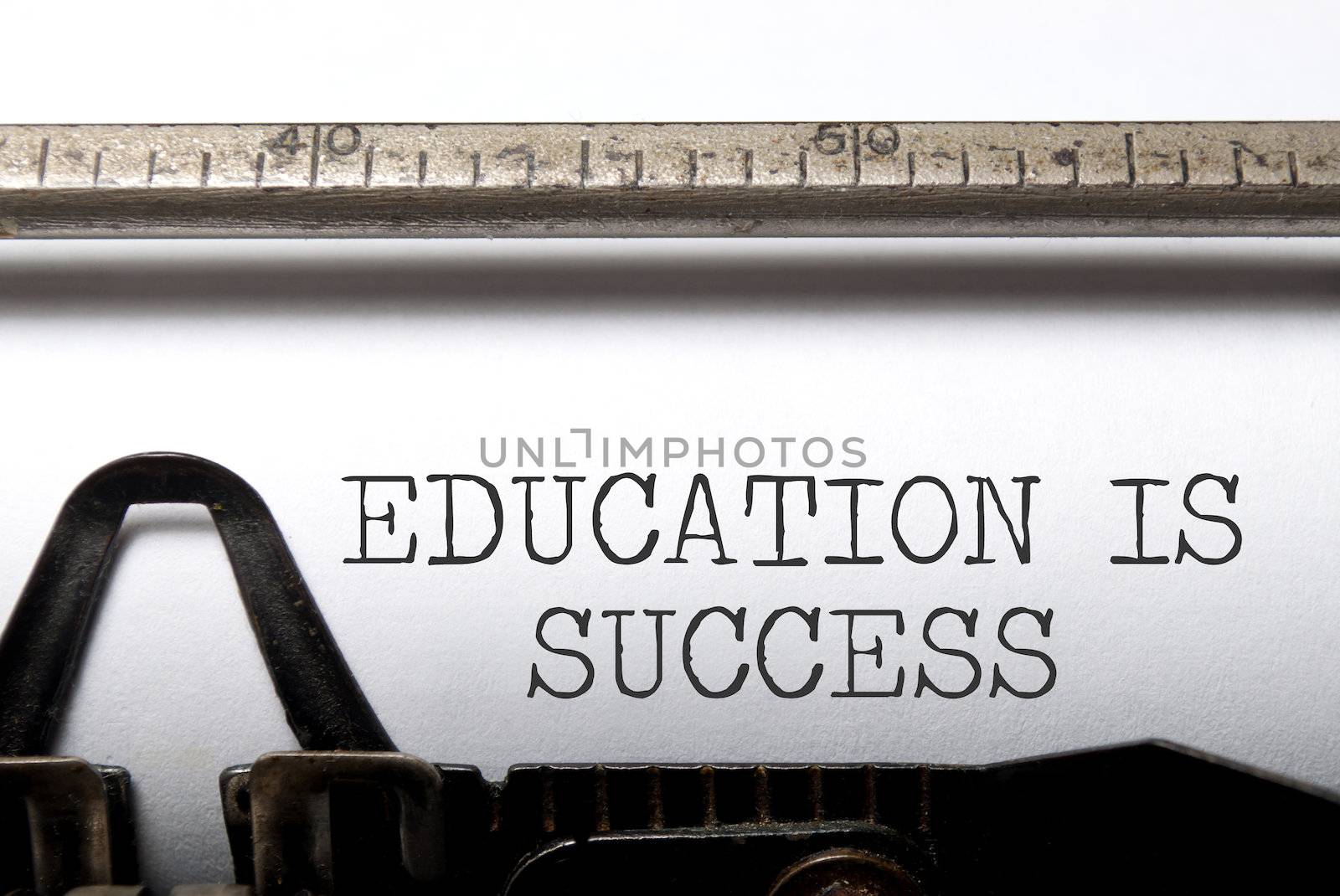 Education is success printed on a vintage typewriter 