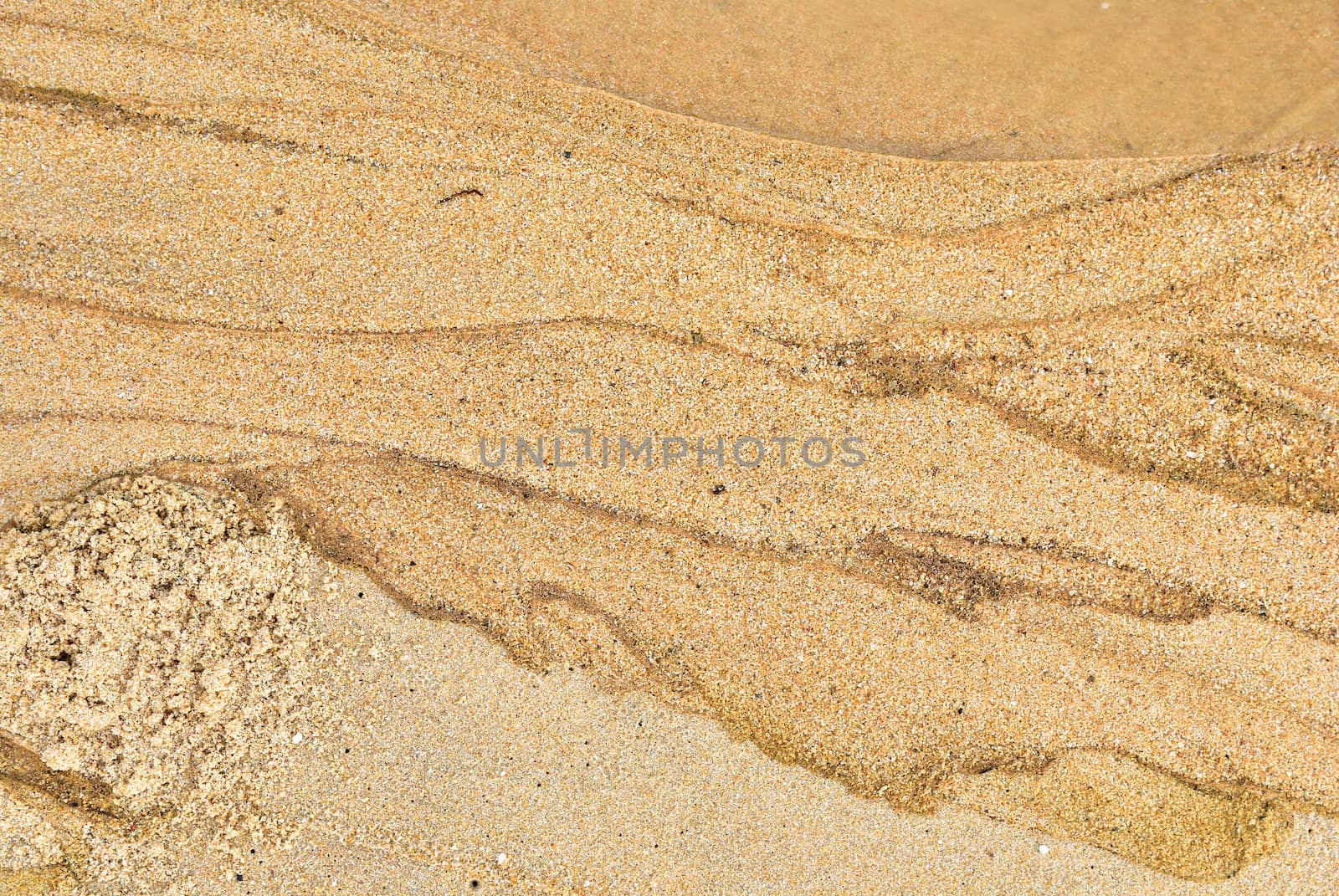 Texture of sand and waste water leak on beach . by teen00000