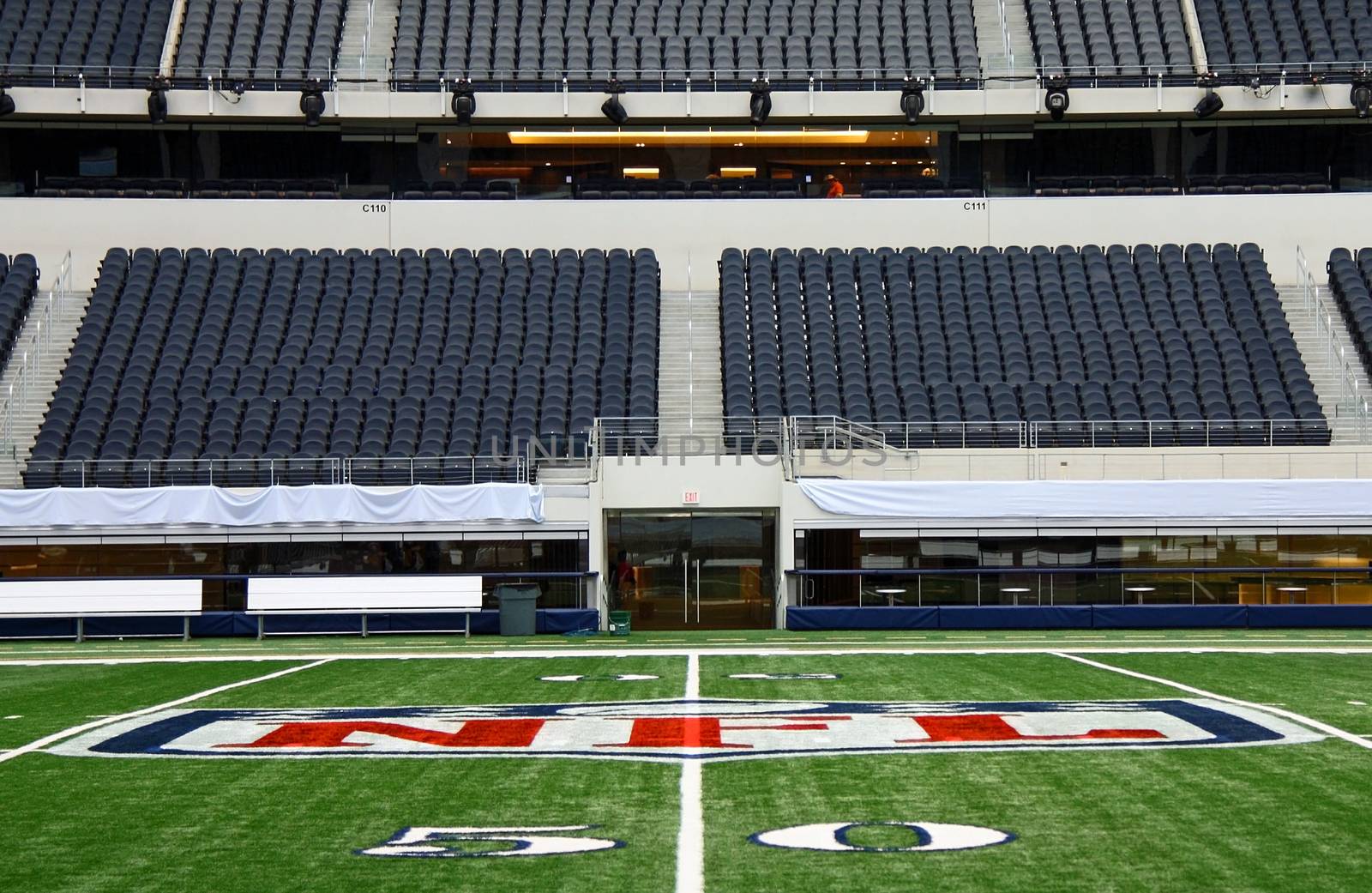 ARLINGTON - JAN 26: A view of the 50 yard line and player field entrance in Cowboys Stadium in Arlington, Texas sight of Steelers Packers Super Bowl XLV. Taken January 26, 2011 in Arlington, TX.