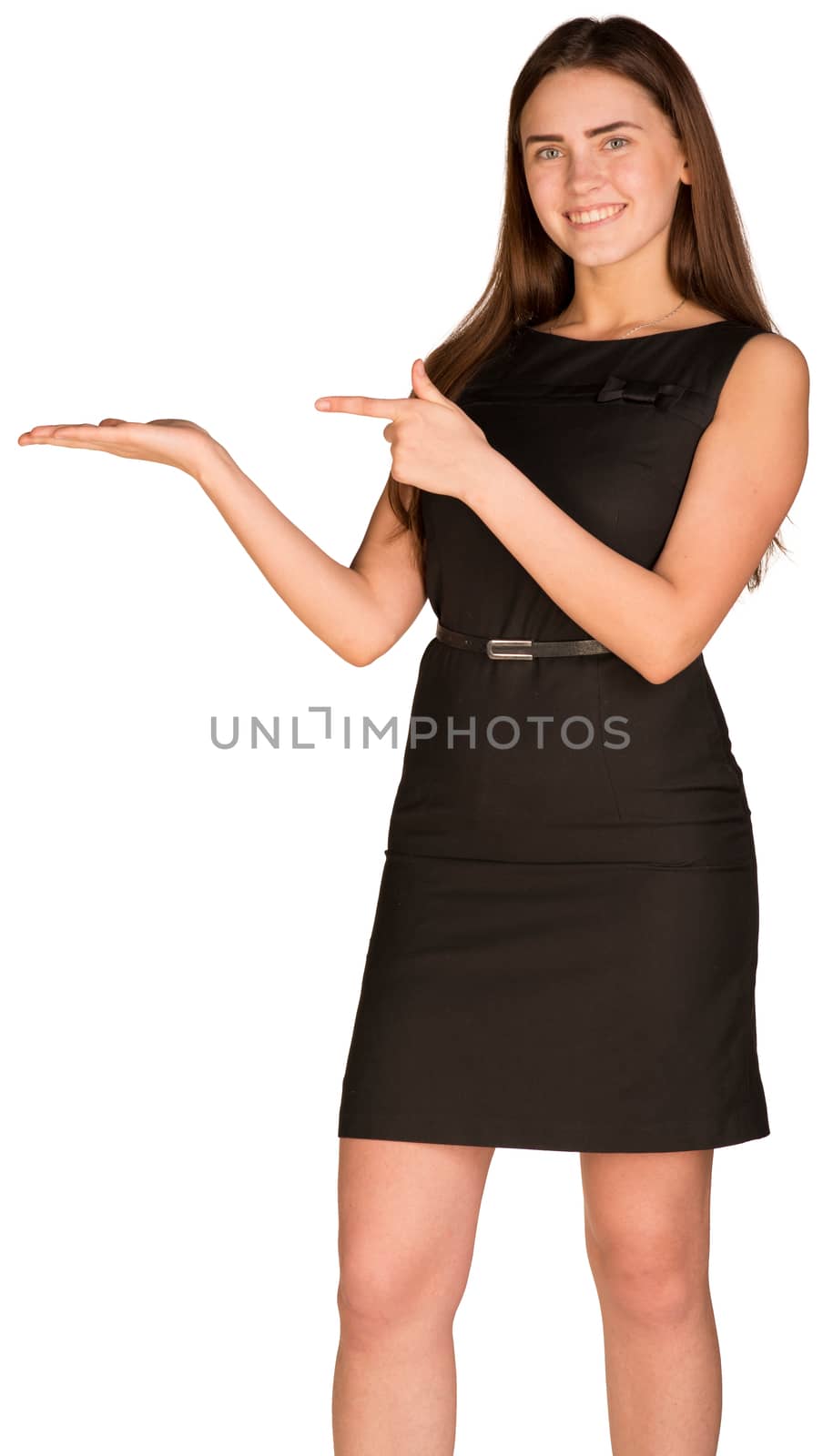 Businesswoman in dress pointing her finger to empty palm. Isolated on the white background