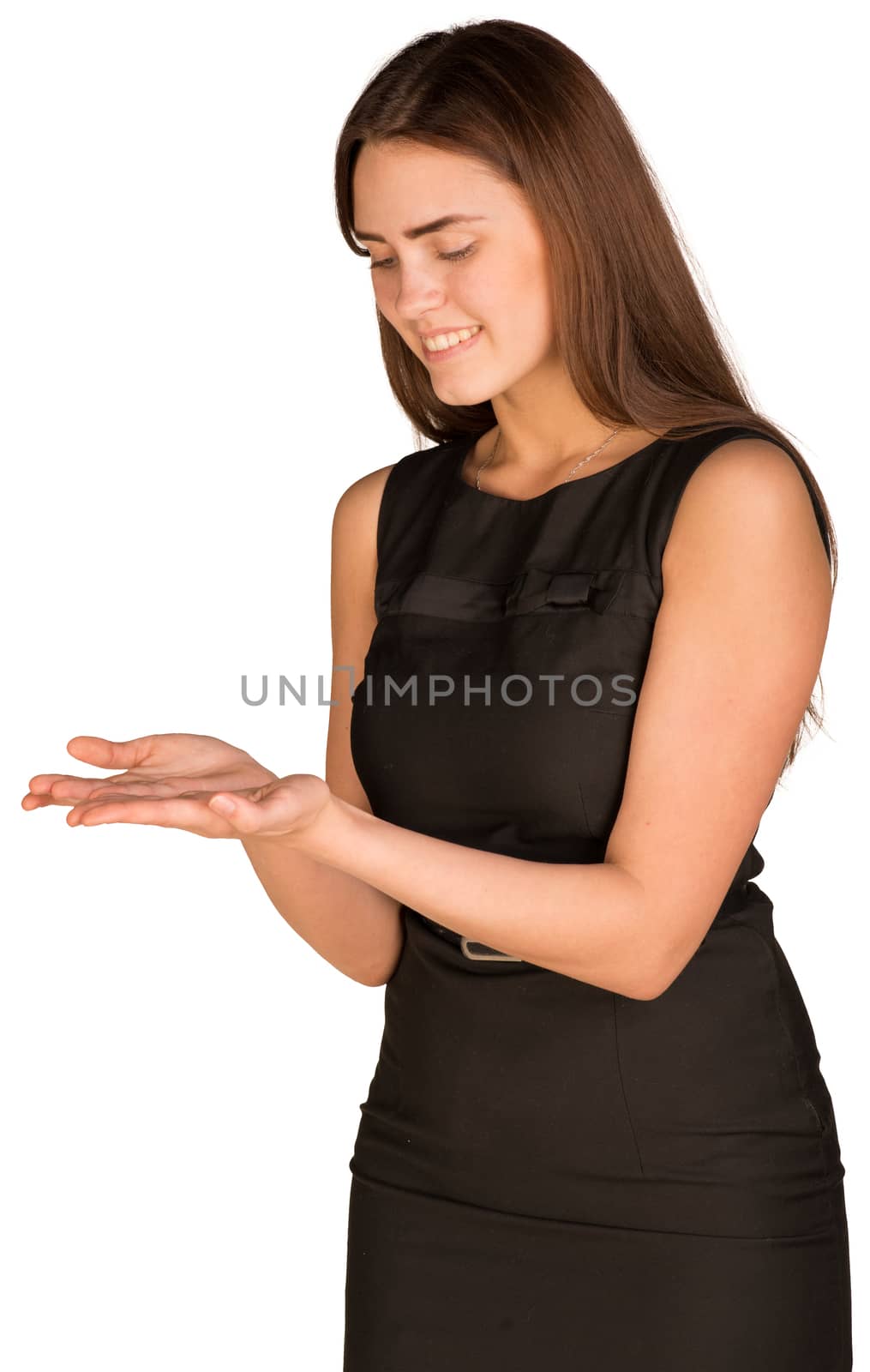 Businesswoman in dress looking in his empty hands. Isolated on the white background
