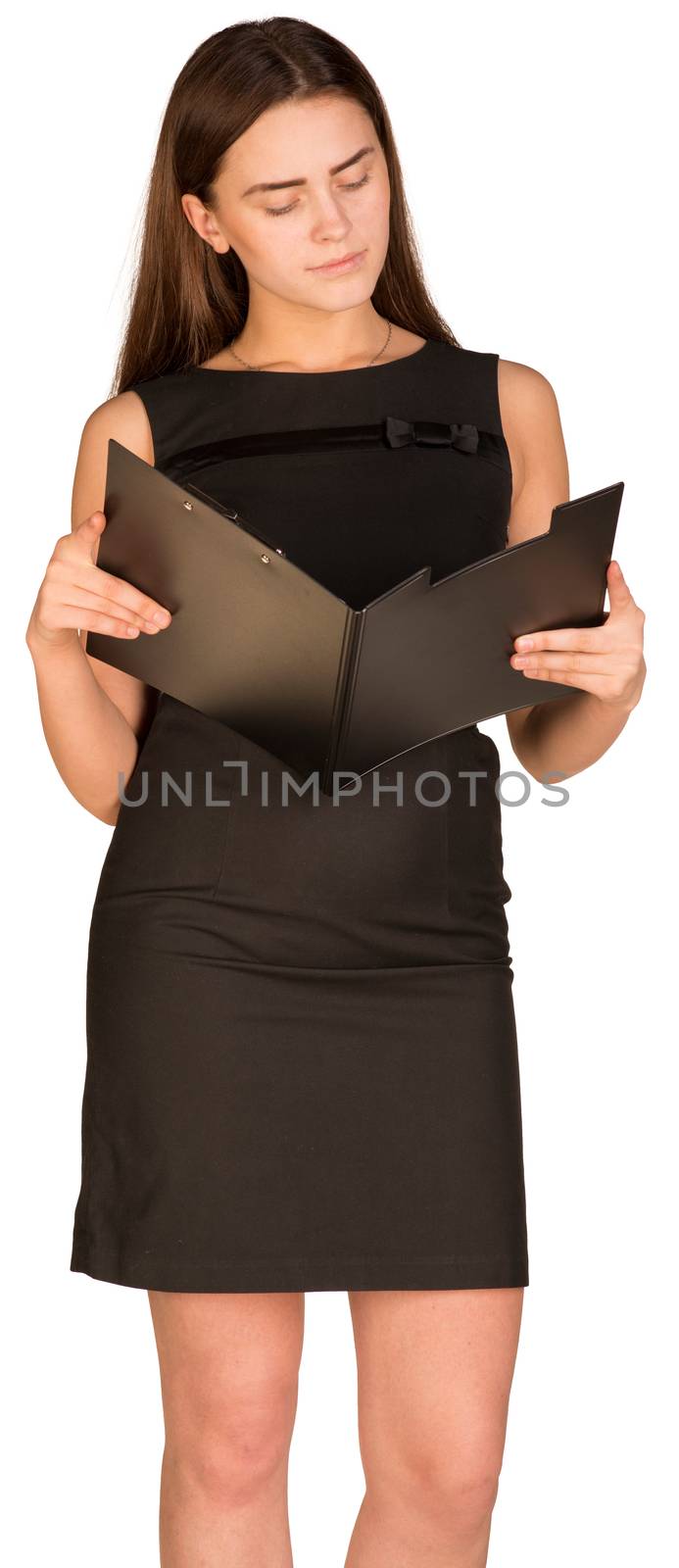 Businesswoman in dress looking in open paper folder. Isolated on the white background