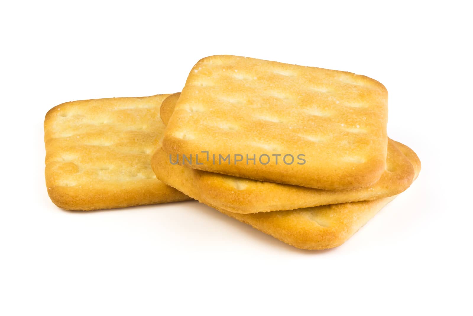 Four square plate of salty crackers isolated on white background