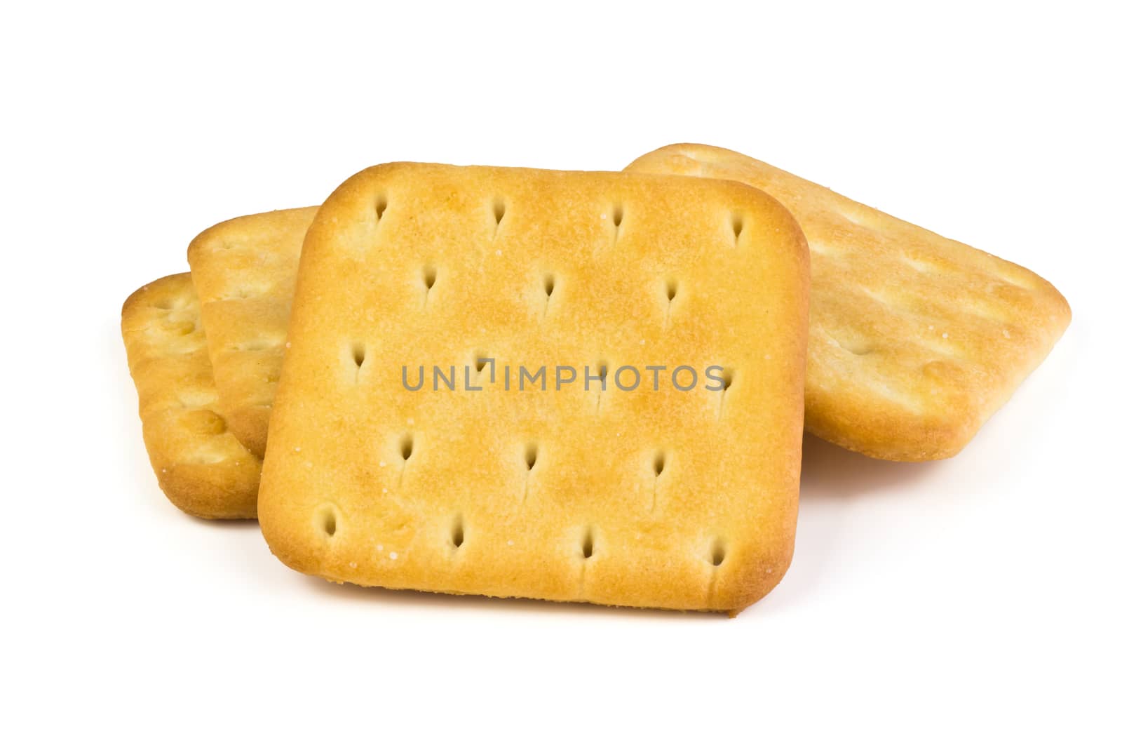 Four square plate of salty crackers isolated on white background