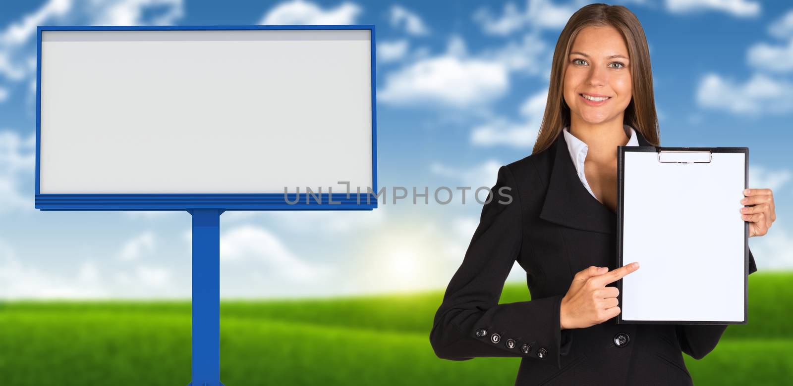 Businesswoman holding paper holder. Blank billboard, blue sky and green grass as backdrop