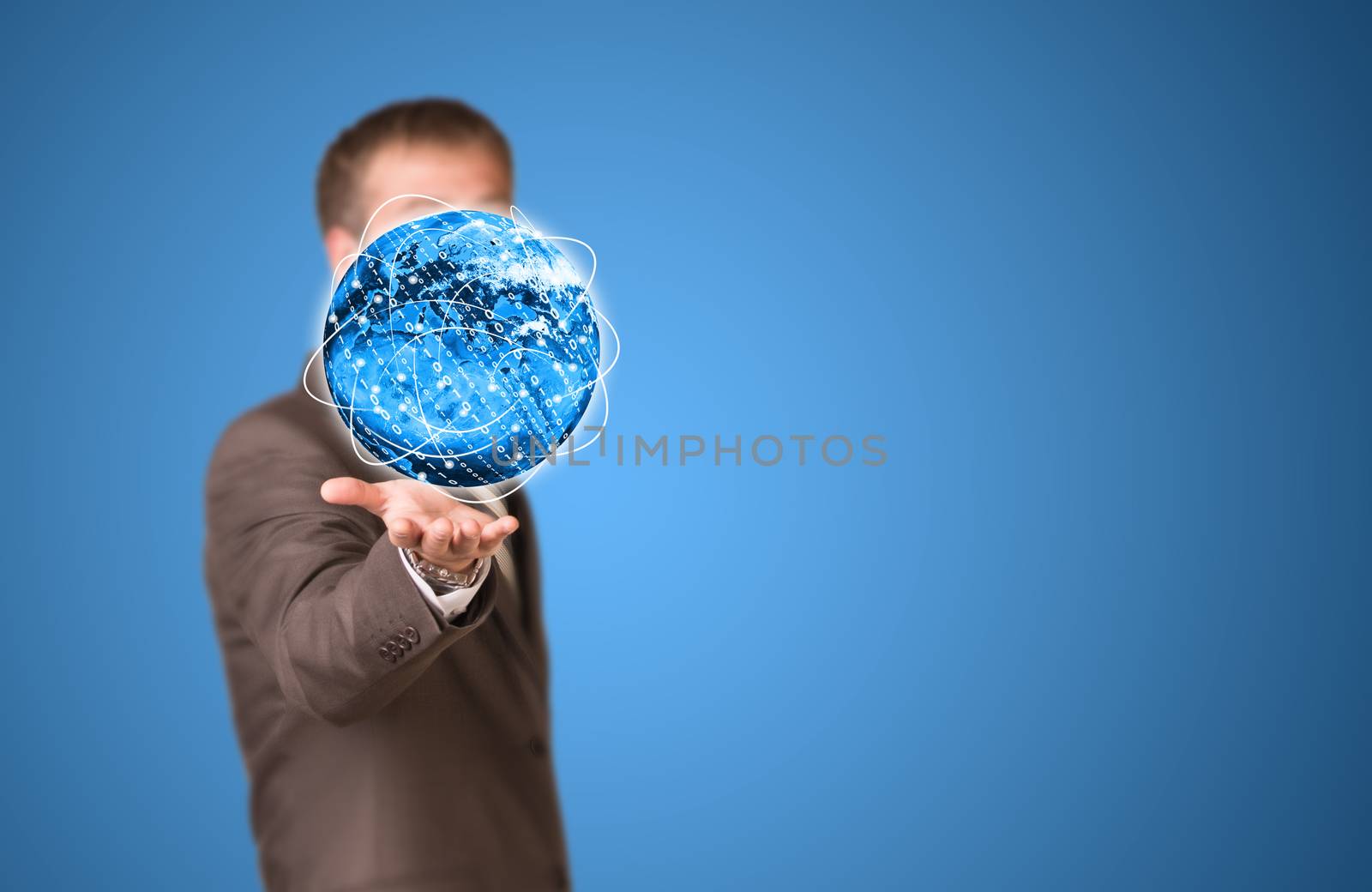 Glowing lines and Earth. Businessman in suit as backdrop. Elements of this image are furnished by NASA