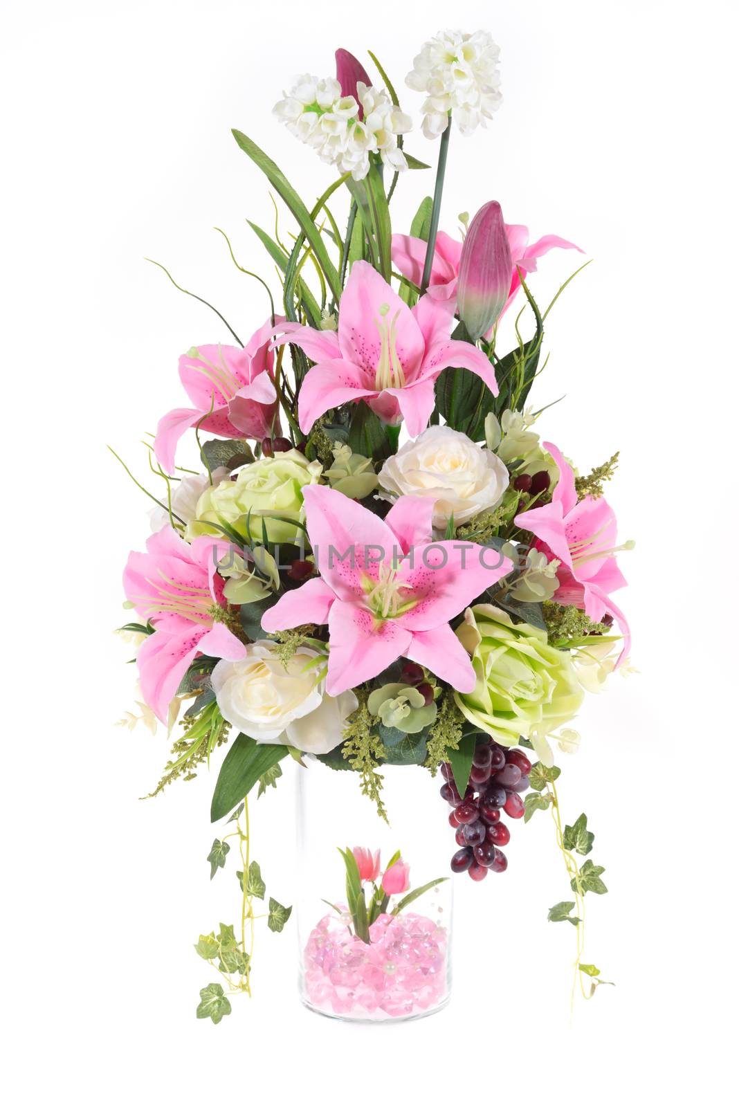 Decoration artificial plastic flower with glass vase, pink crystal inside isolated on white background