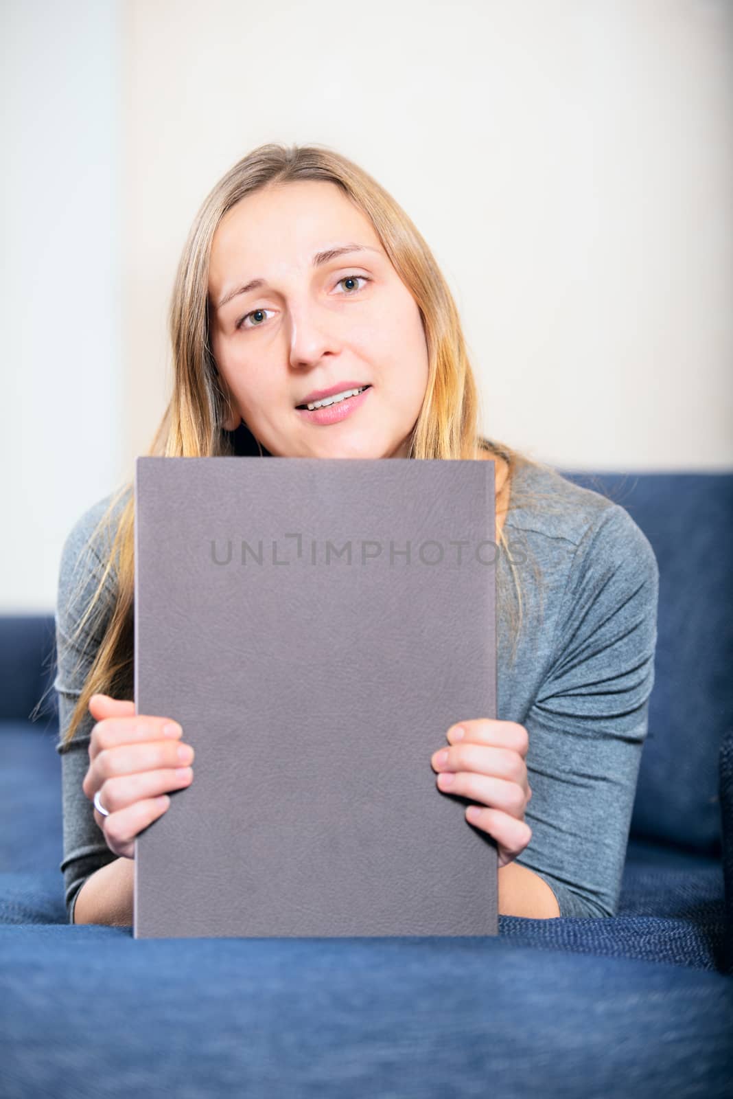 friendly young woman portrait studio shot